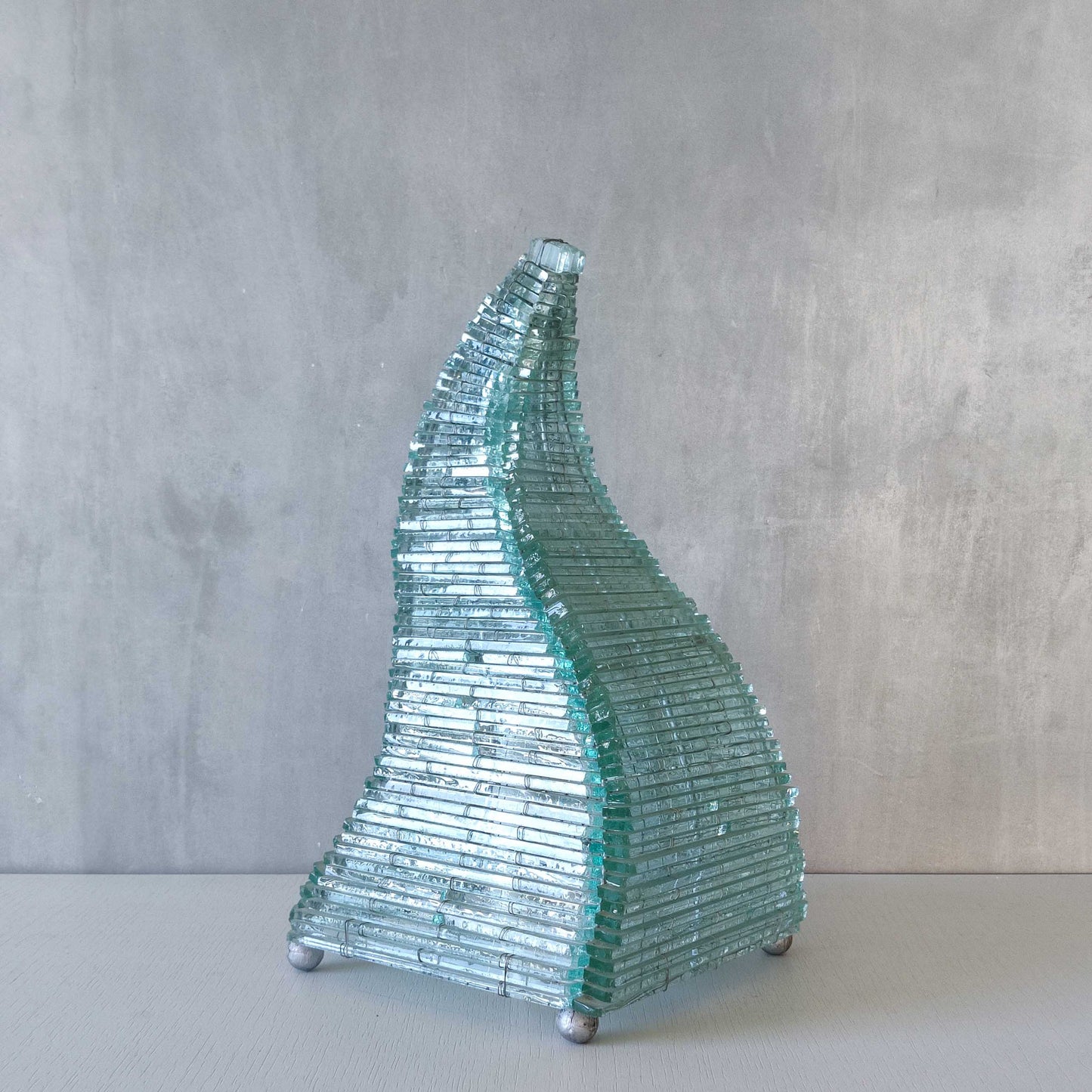 A 1970s stacked glass shard sculptural twisted pyramid lamp