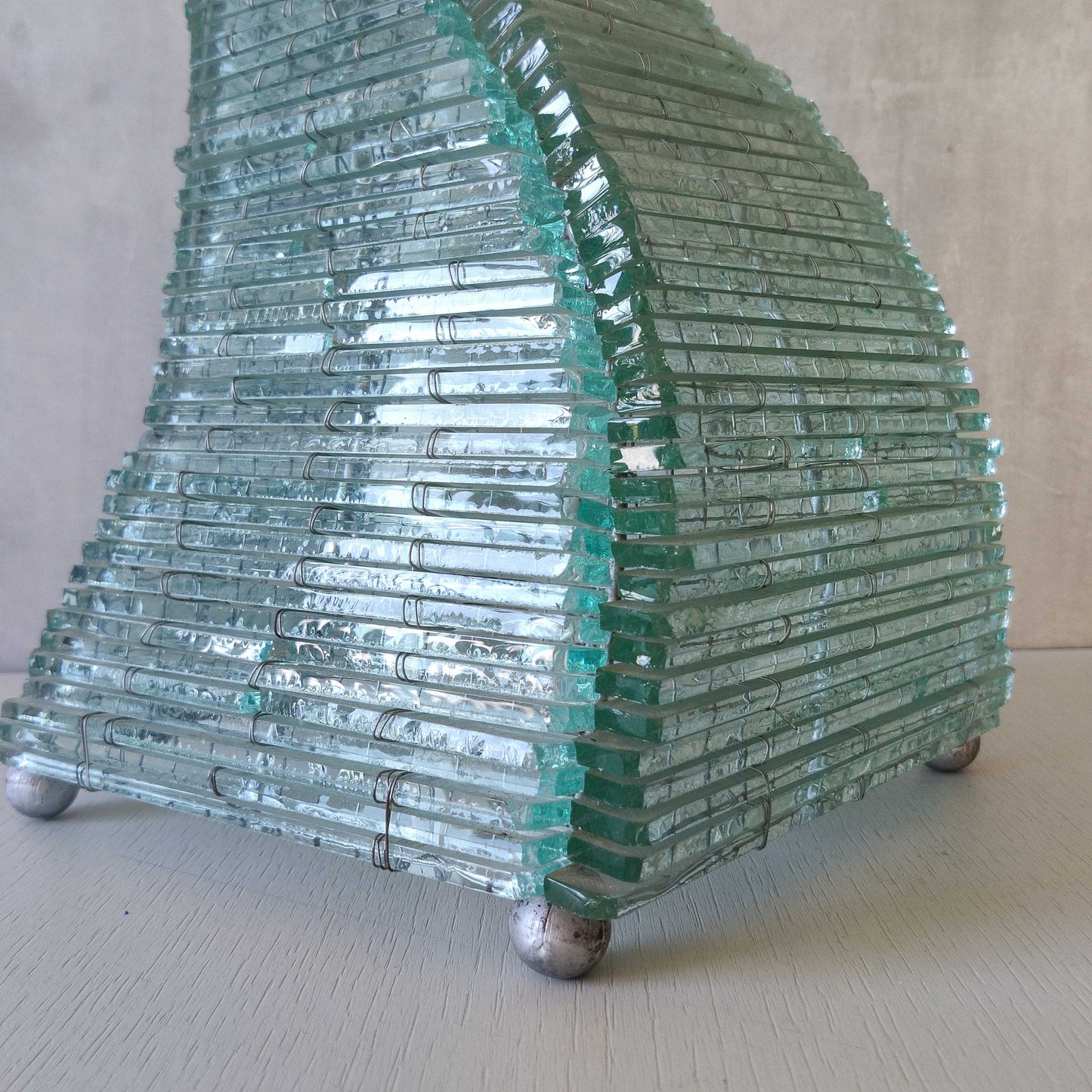 A 1970s stacked glass shard sculptural twisted pyramid lamp