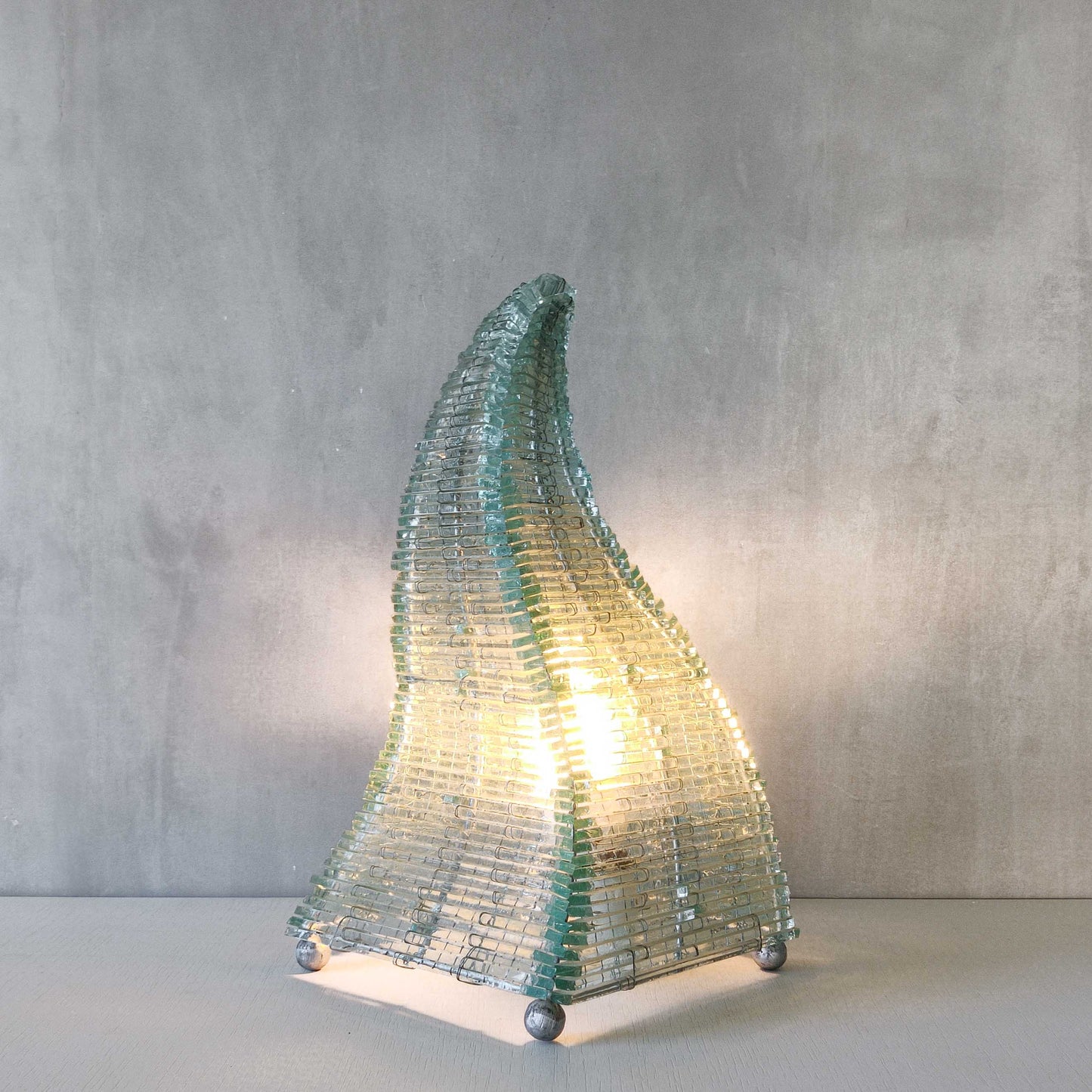 A 1970s stacked glass shard sculptural twisted pyramid lamp
