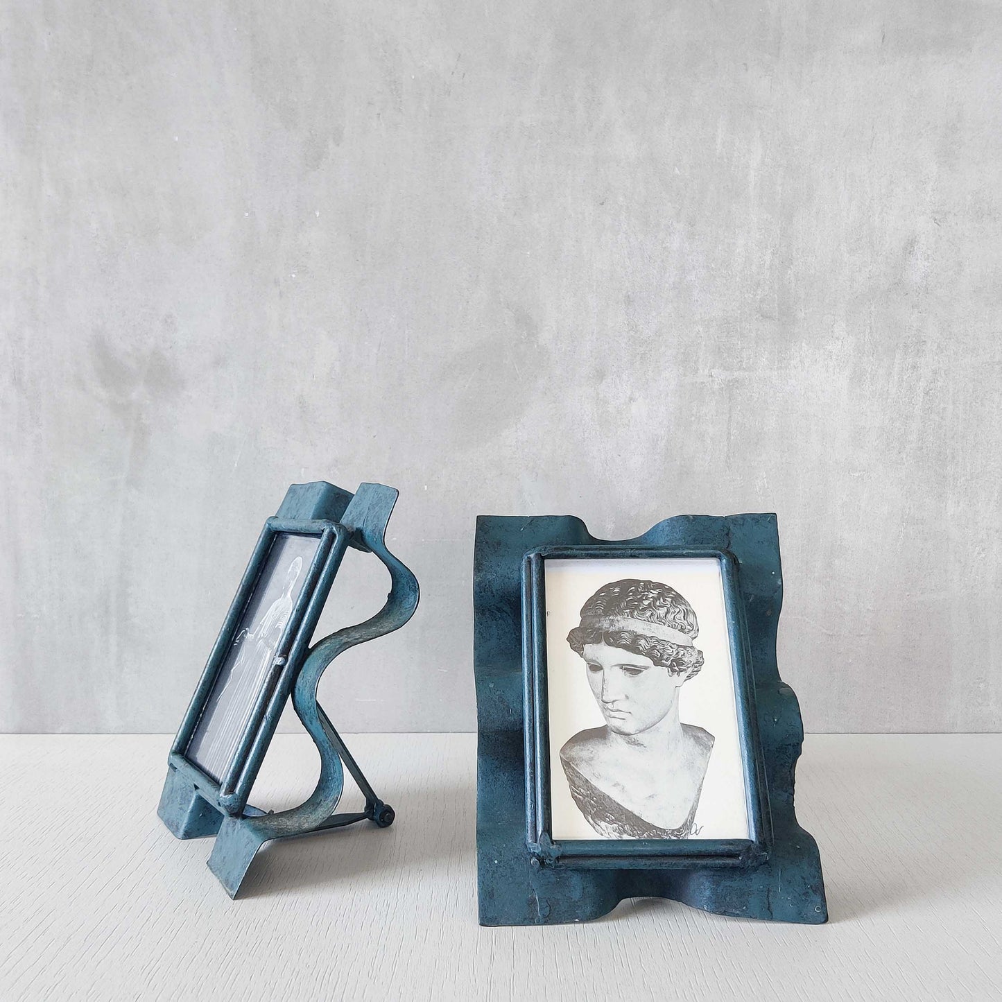 Pair of sculptural painted frames
