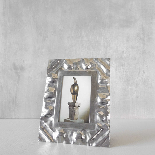 A 1990s chrome crumpled sculptural photo picture frame