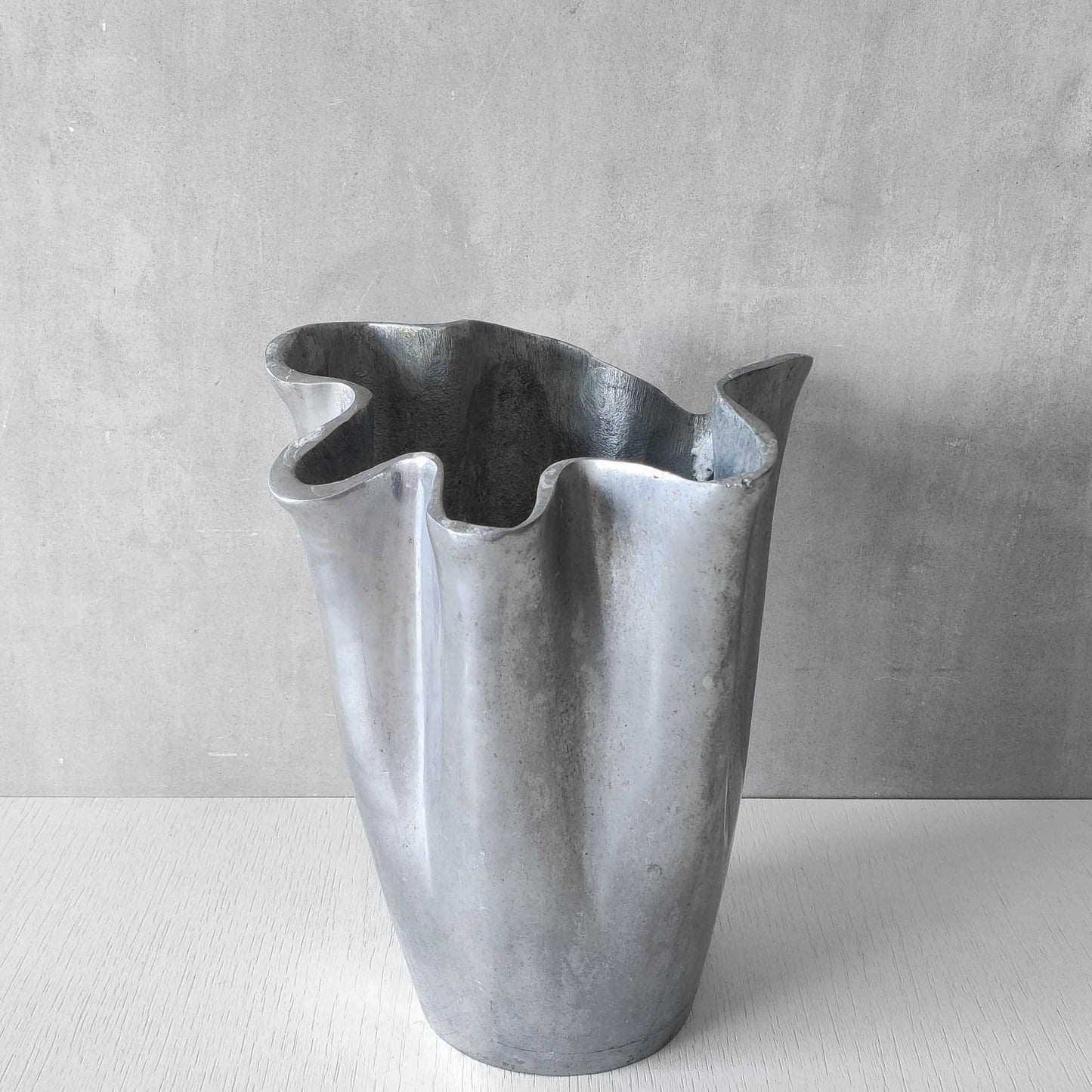 Cast aluminium vase