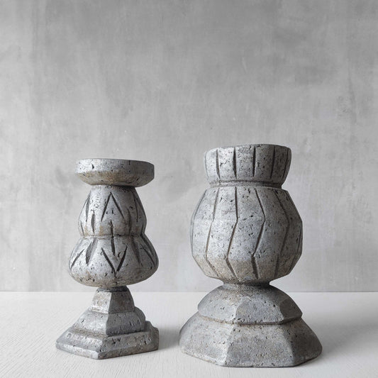 A pair of brutalist sculptural raw sand cast aluminium urns vessels