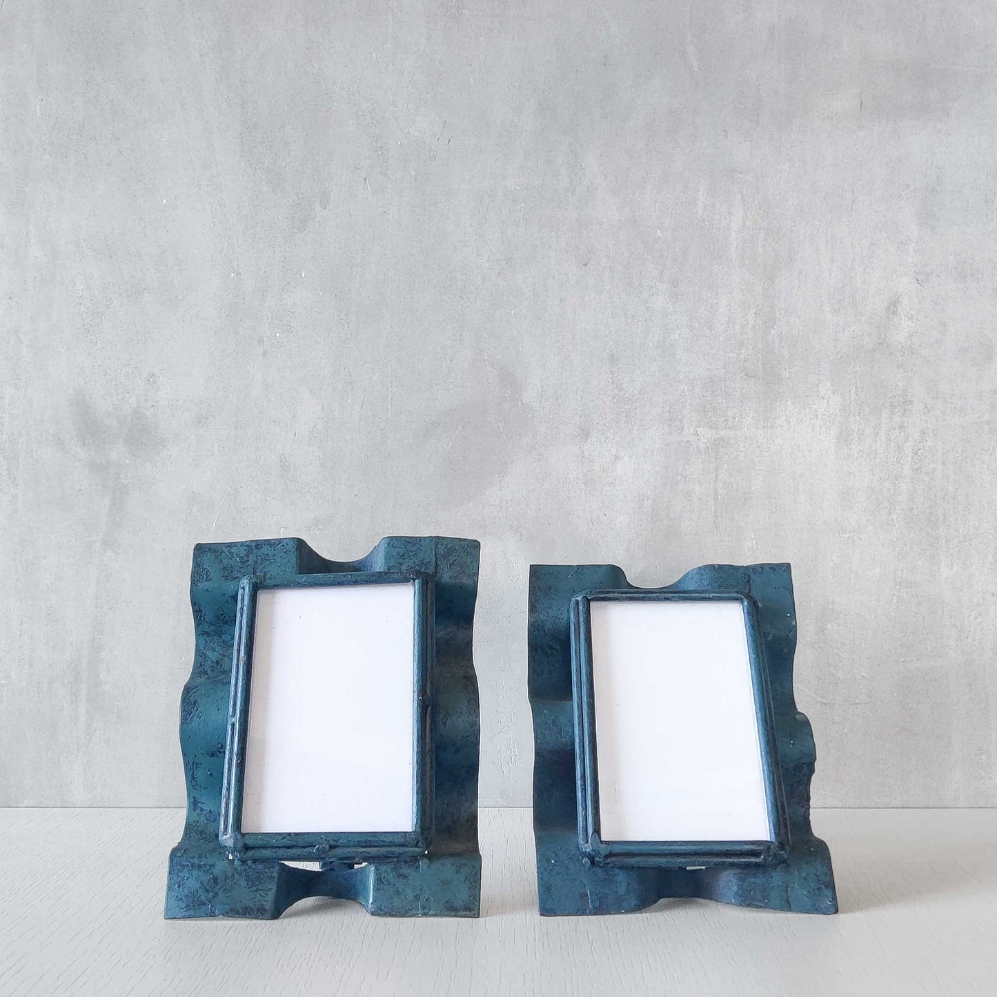 Pair of sculptural painted frames
