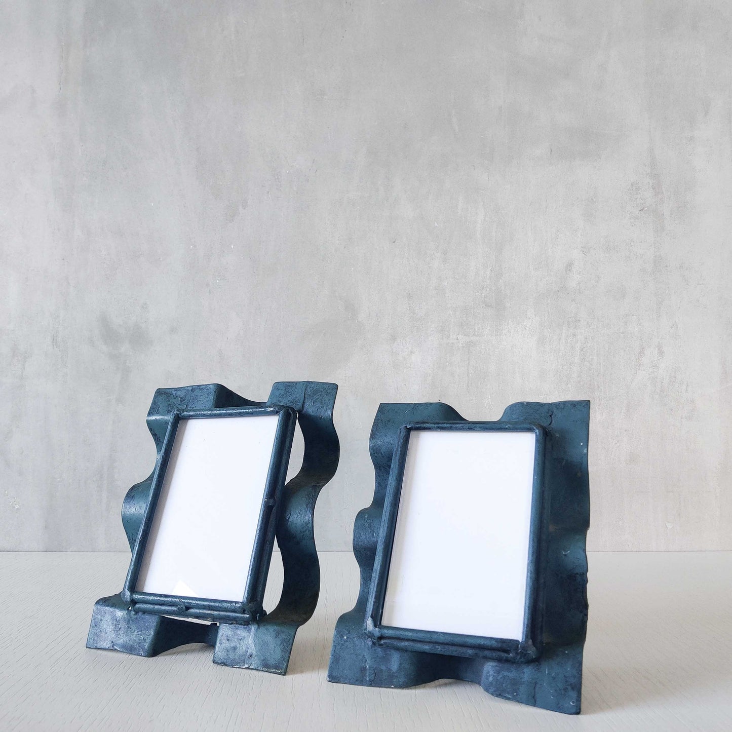 Pair of sculptural painted frames