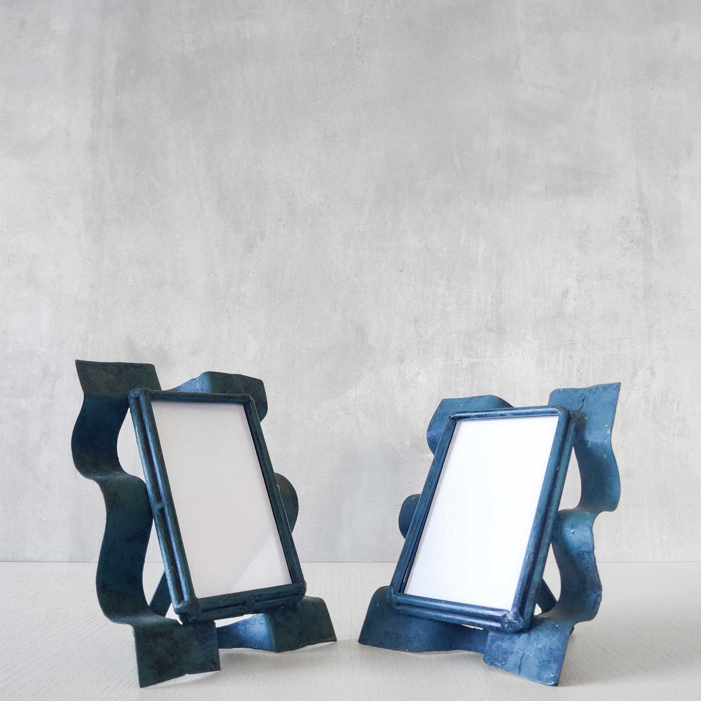 Pair of sculptural painted frames