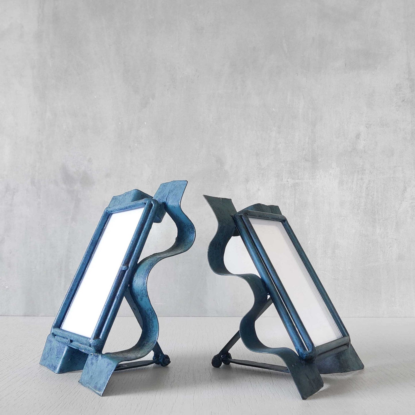 Pair of sculptural painted frames