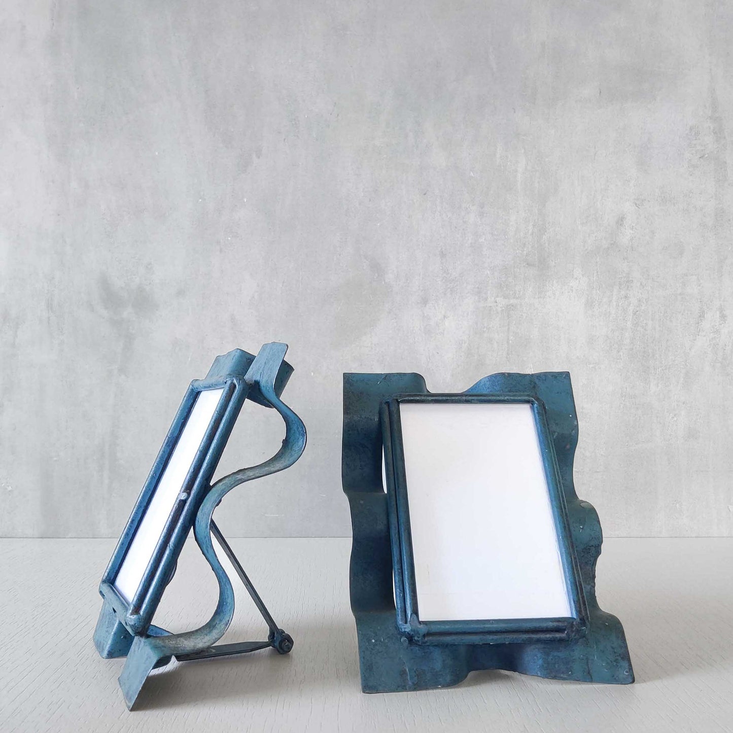 Pair of sculptural painted frames