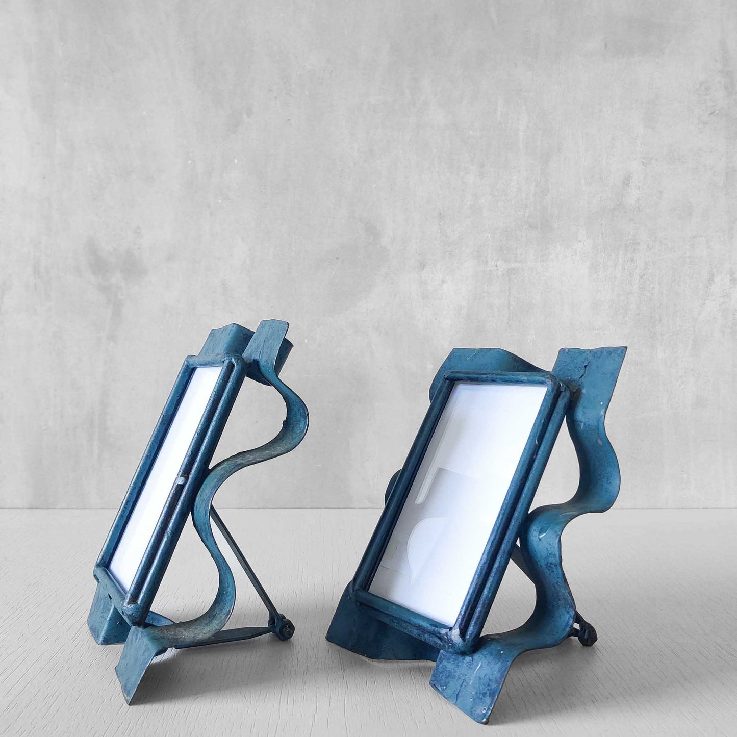 Pair of sculptural painted frames