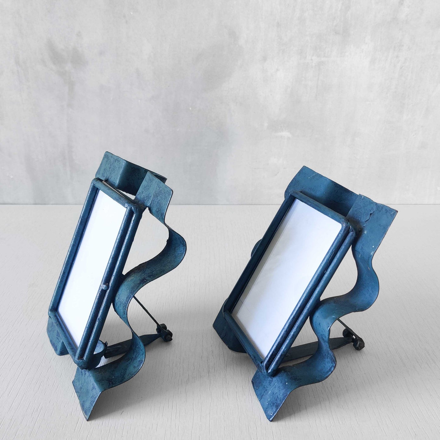 Pair of sculptural painted frames