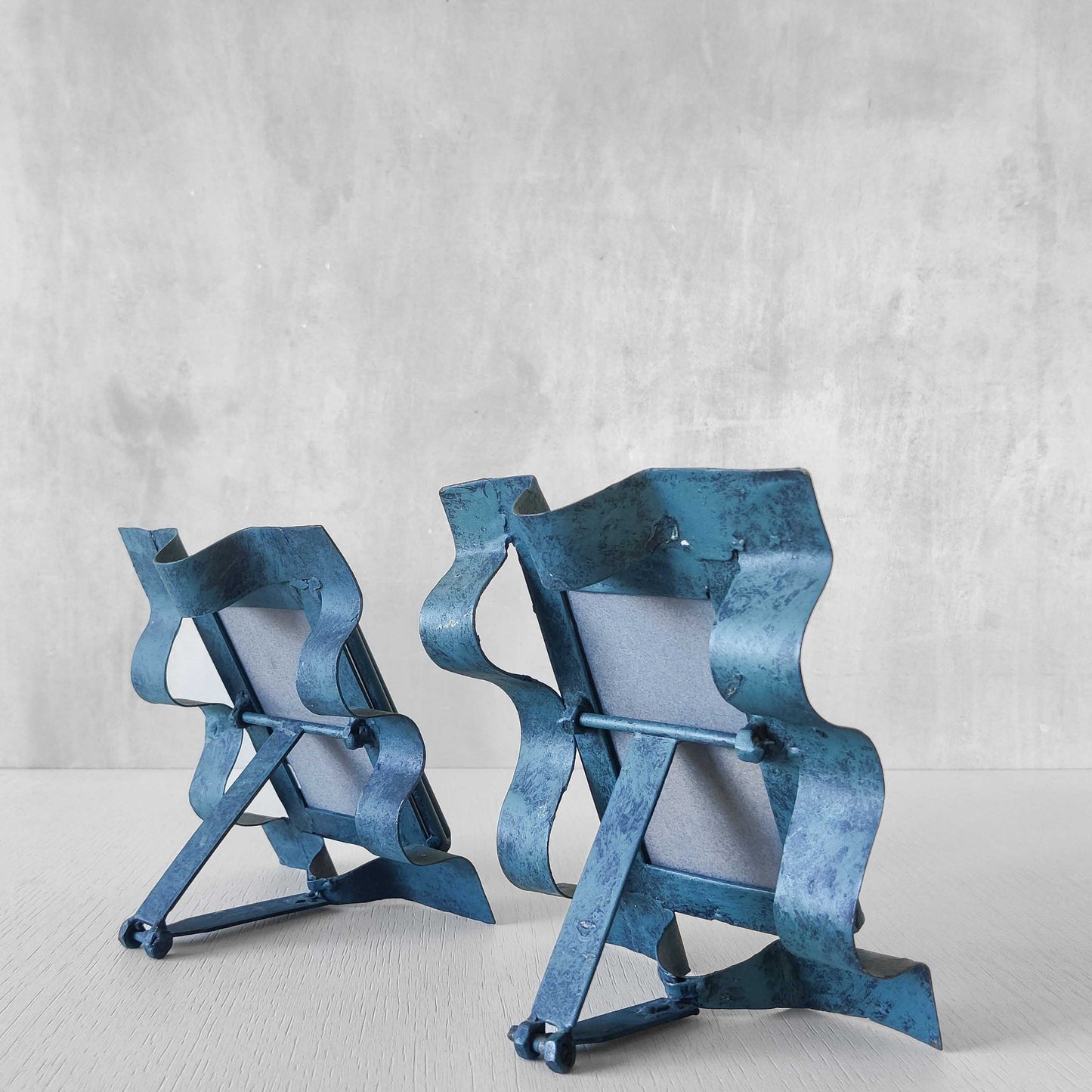 Pair of sculptural painted frames