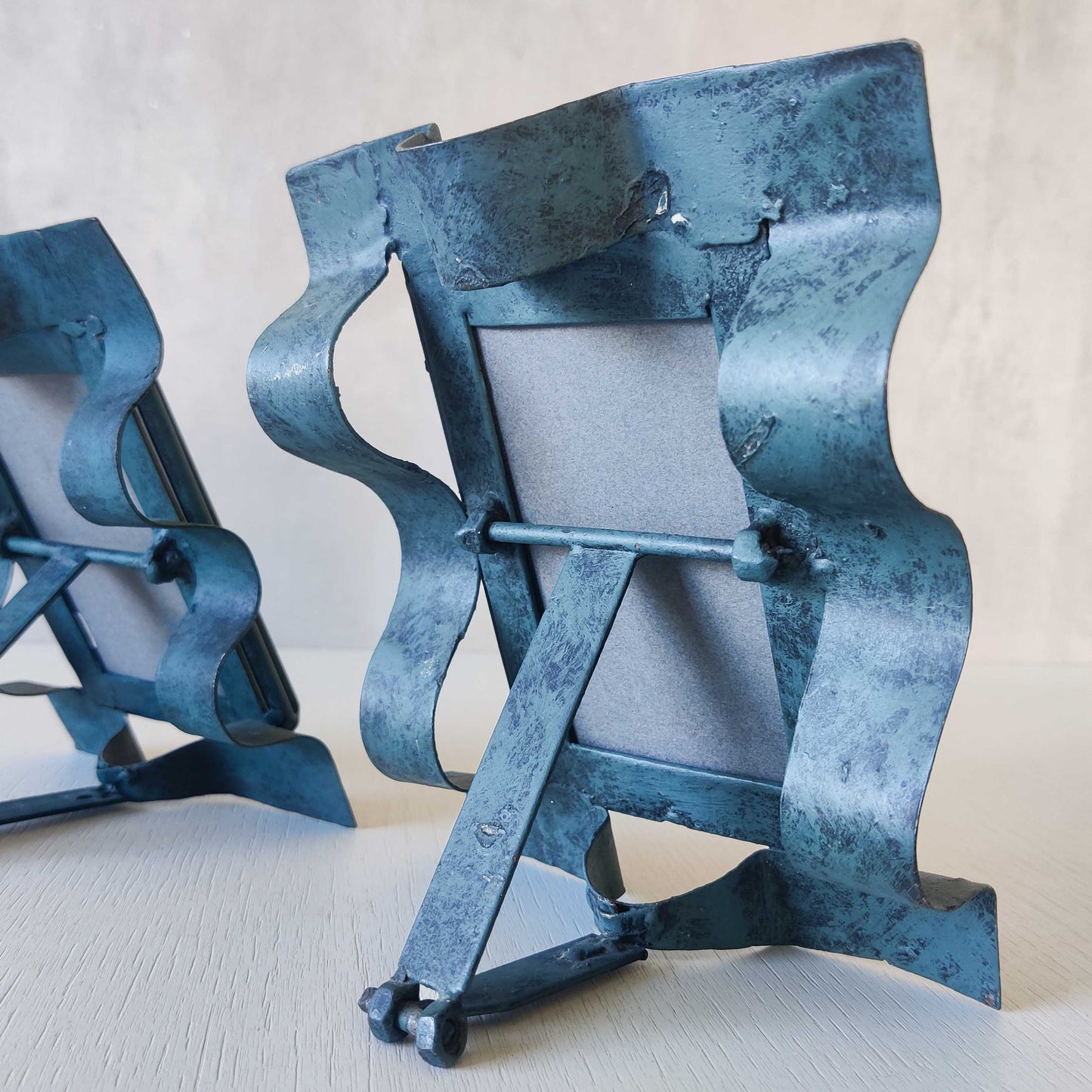 Pair of sculptural painted frames
