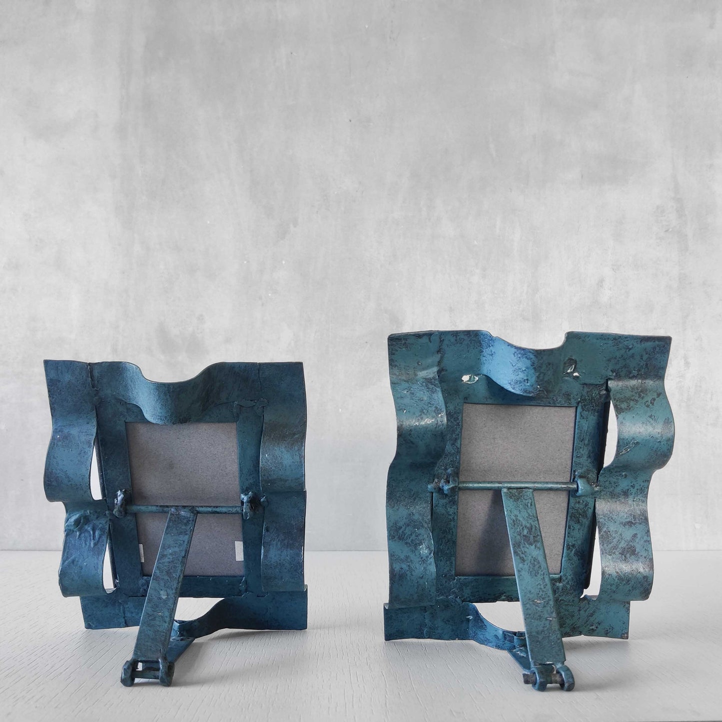 Pair of sculptural painted frames