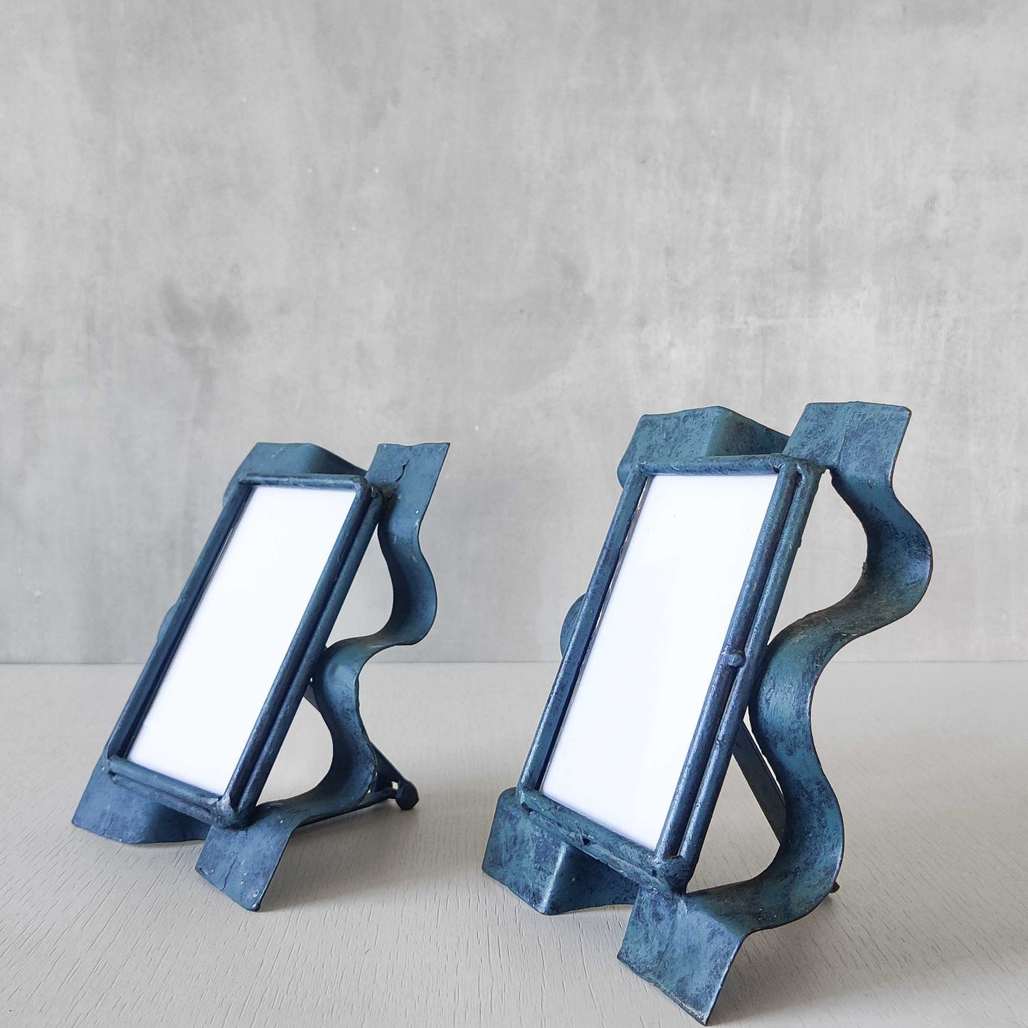Pair of sculptural painted frames