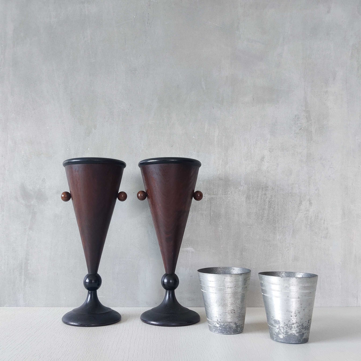 A pair of rosewood vases