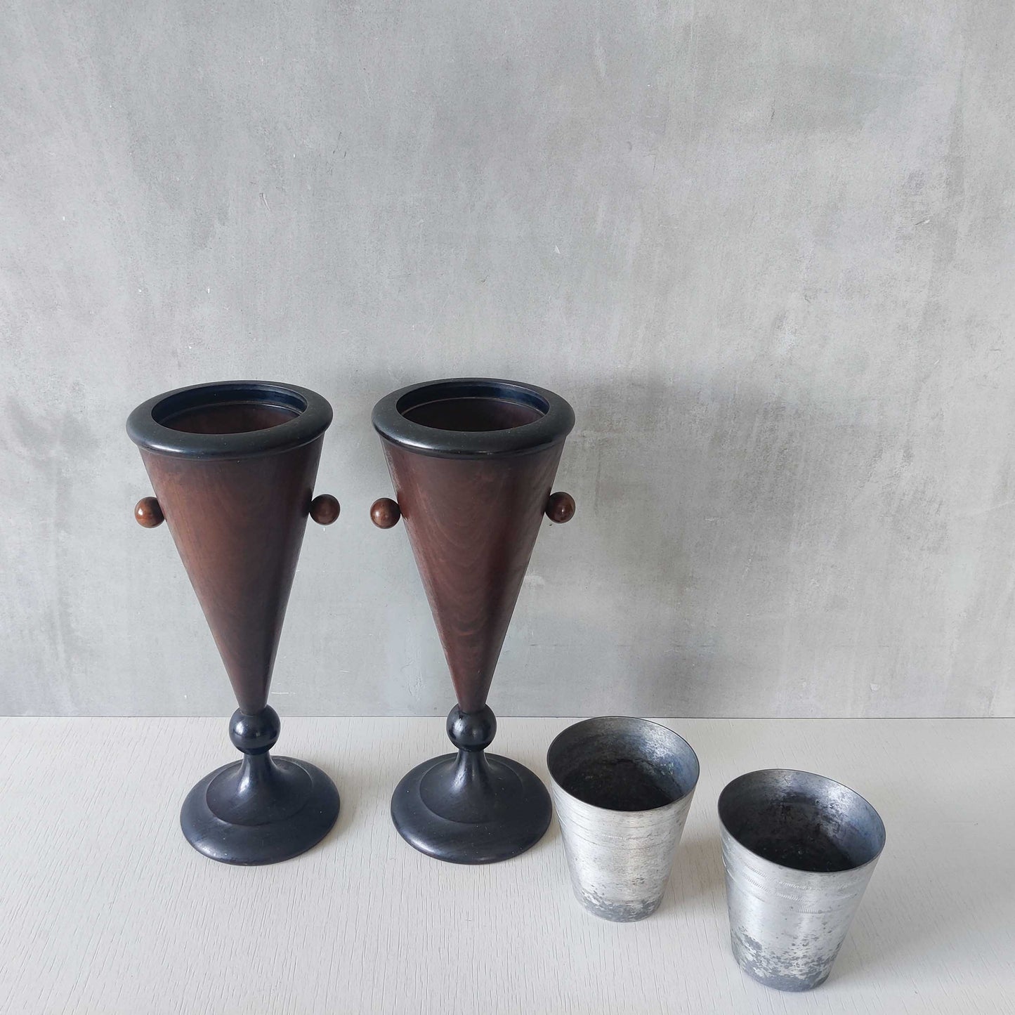 A pair of rosewood vases
