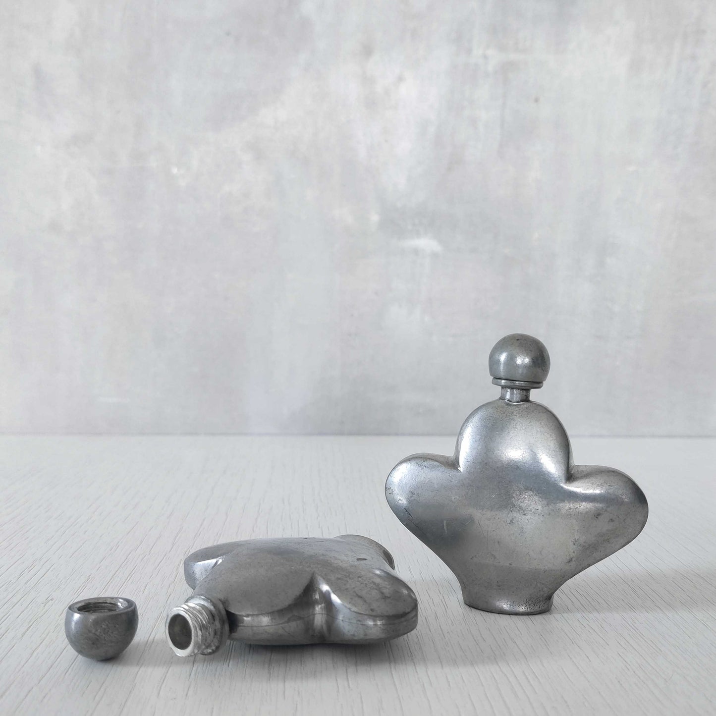Pewter perfume bottles
