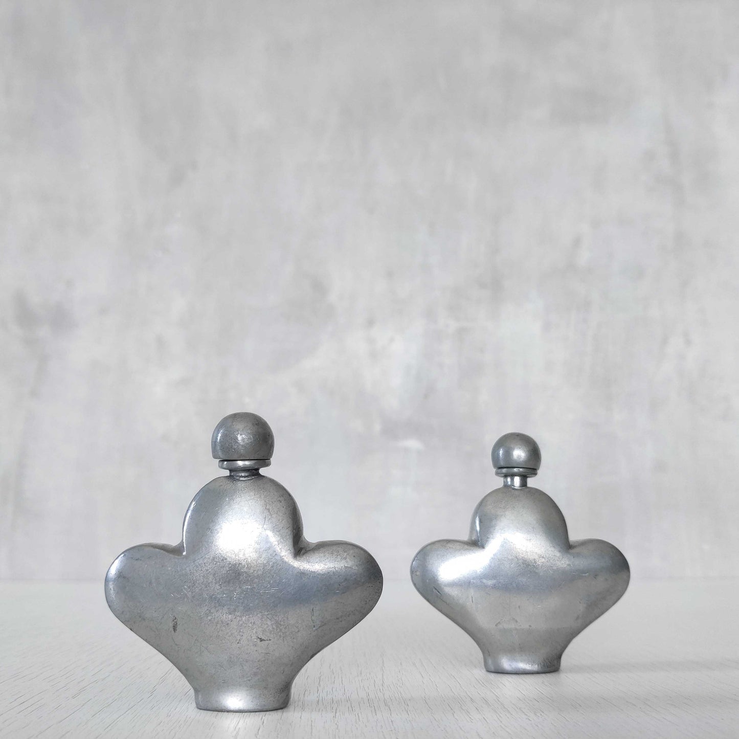 Pewter perfume bottles