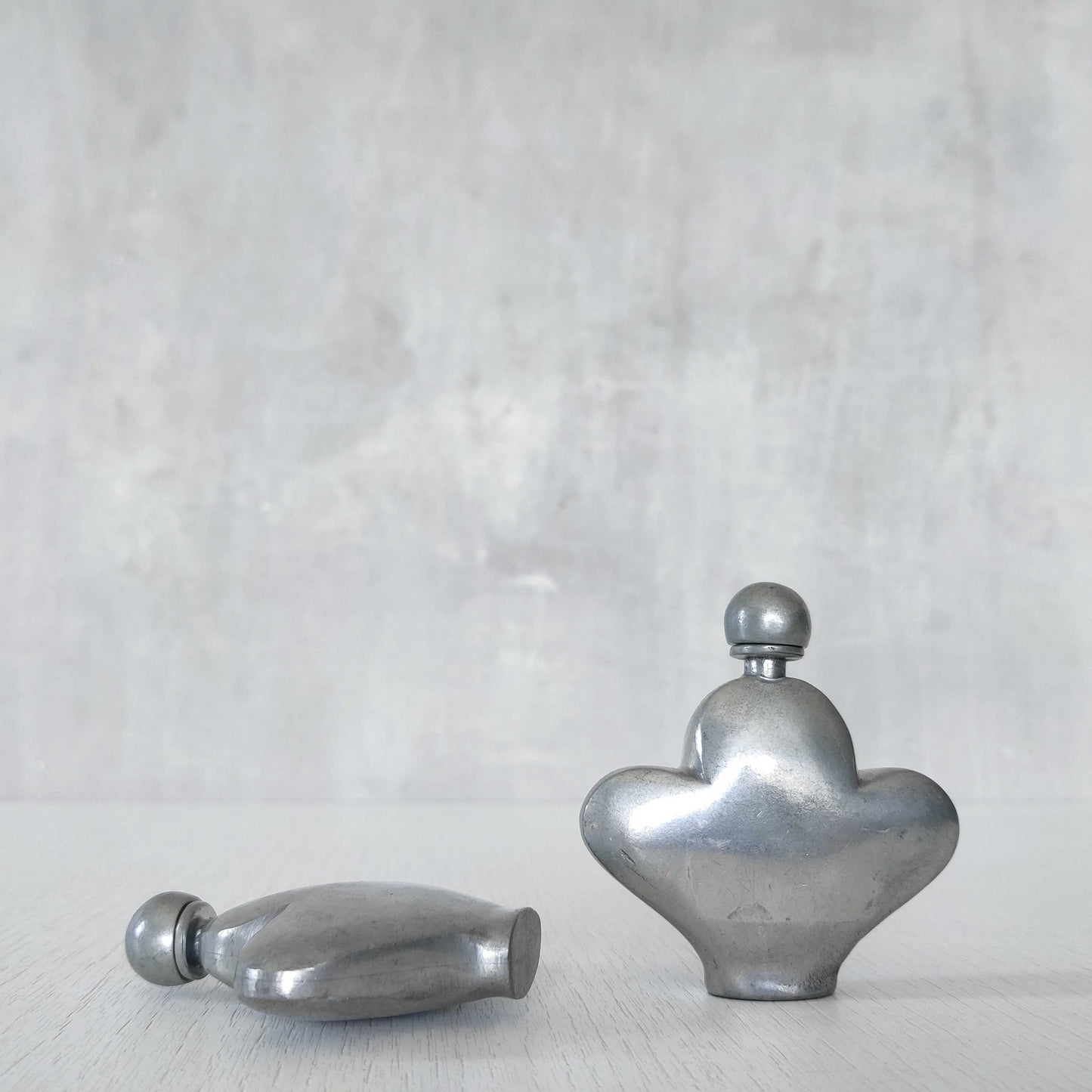 Pewter perfume bottles