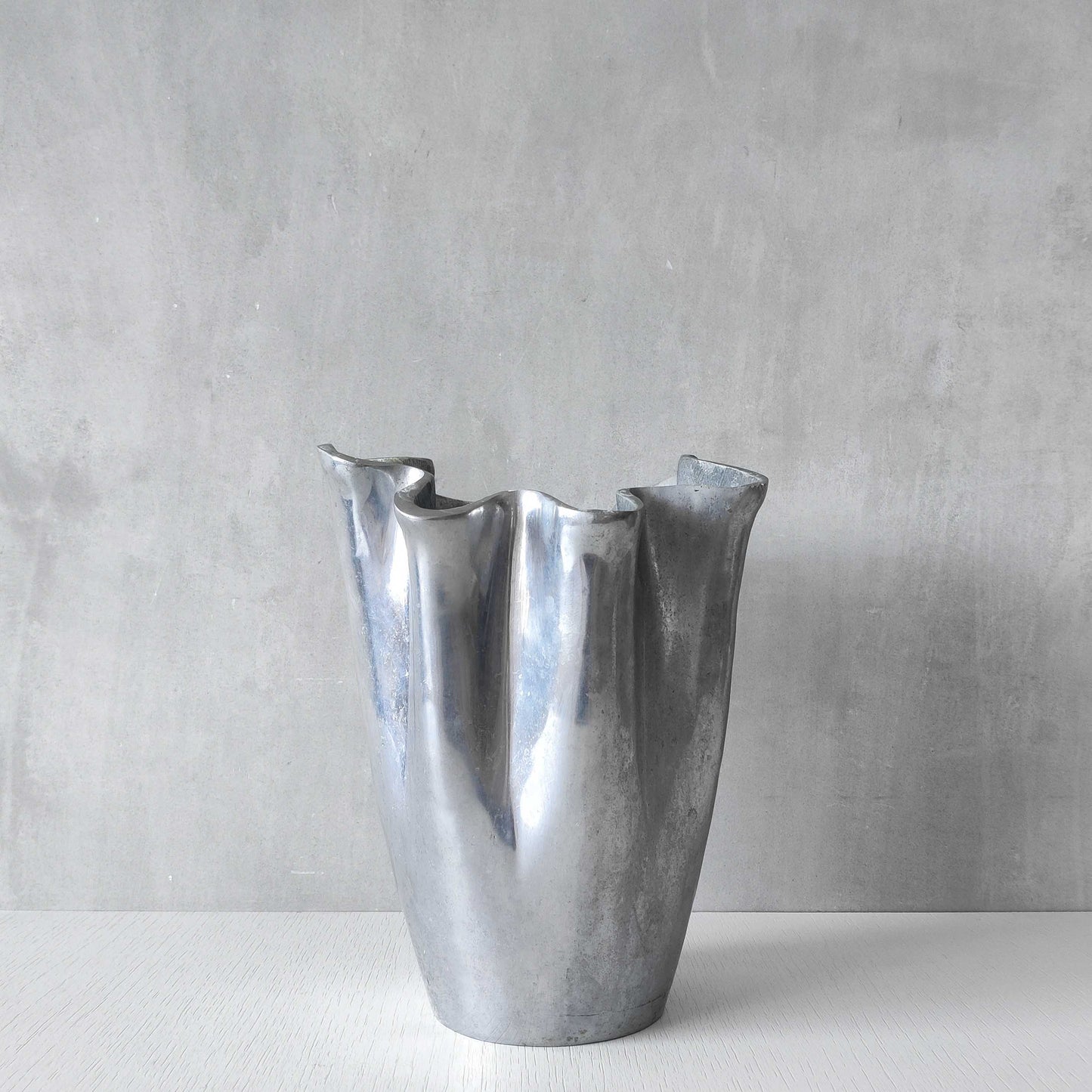 Cast aluminium vase