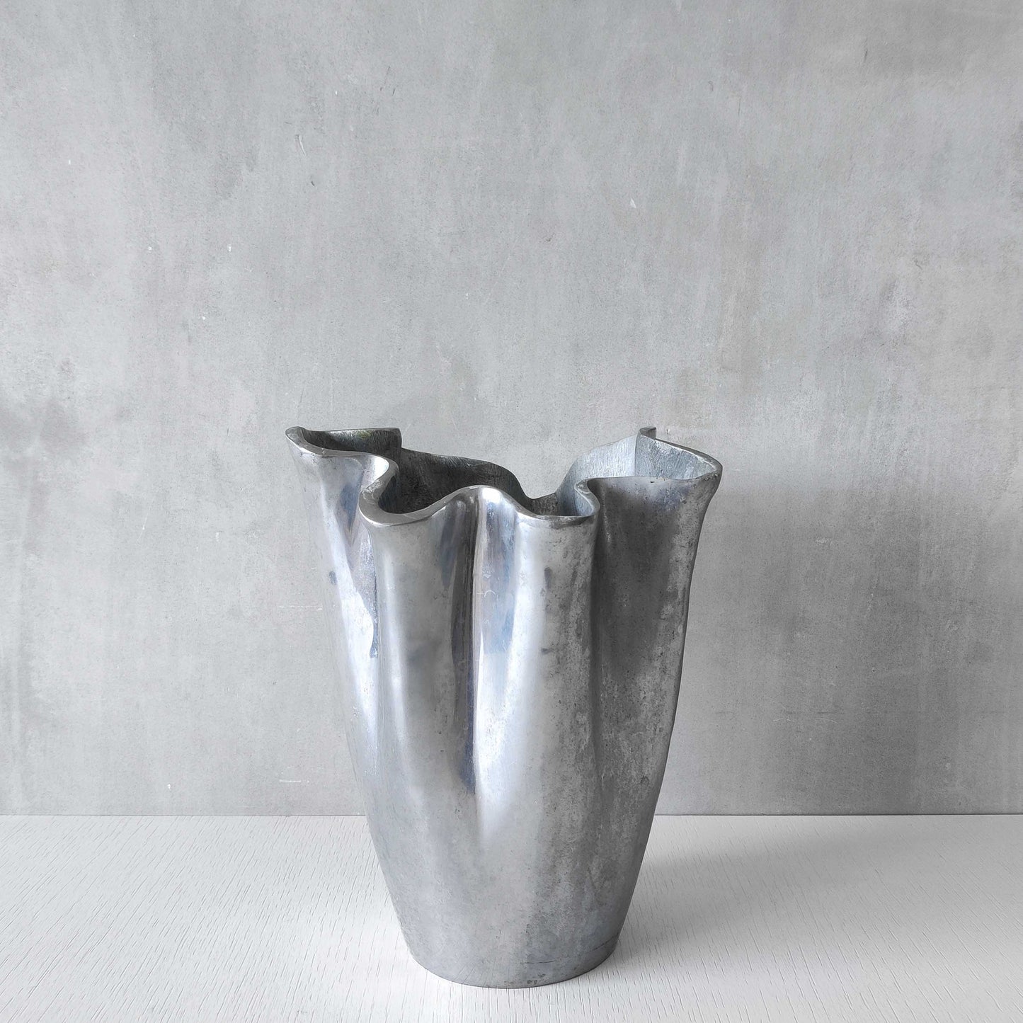 Cast aluminium vase