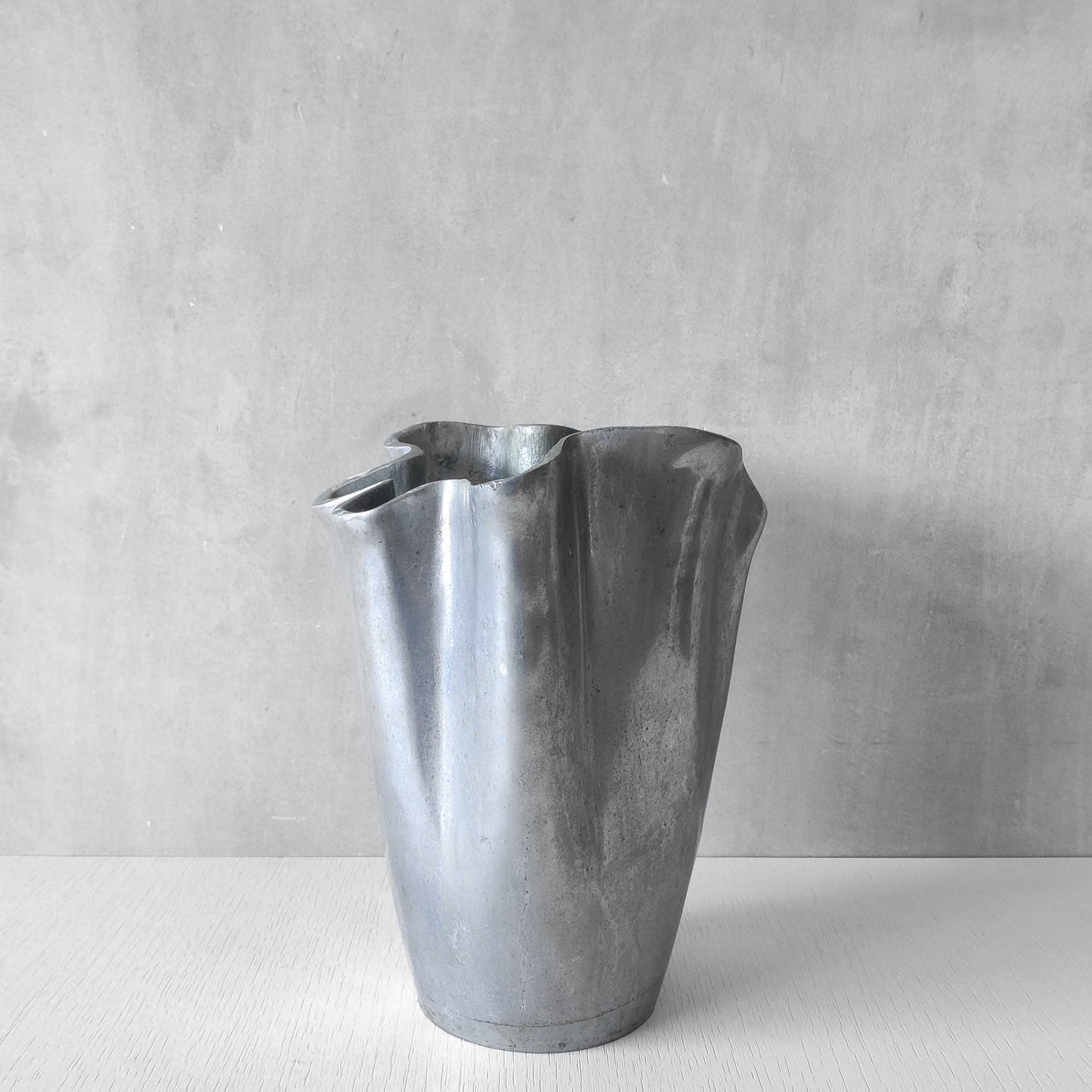 Cast aluminium vase