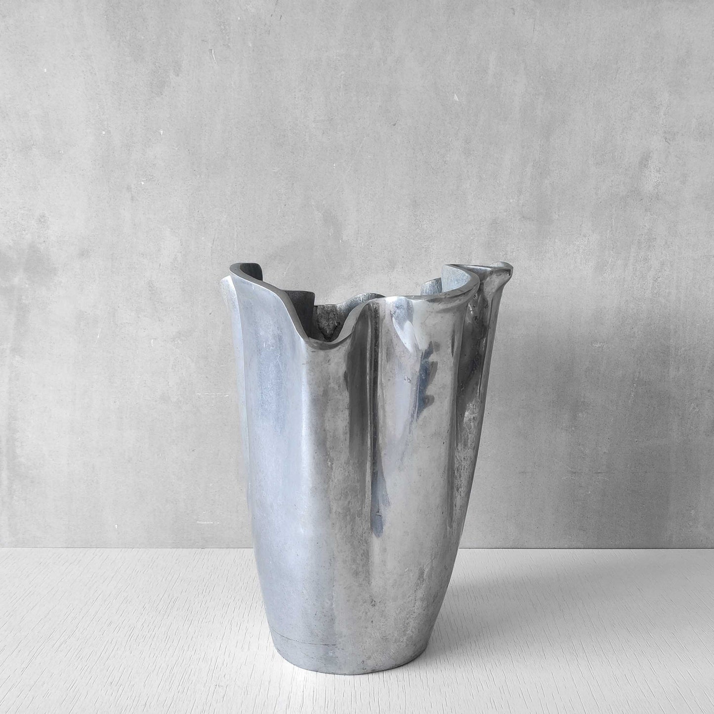 Cast aluminium vase