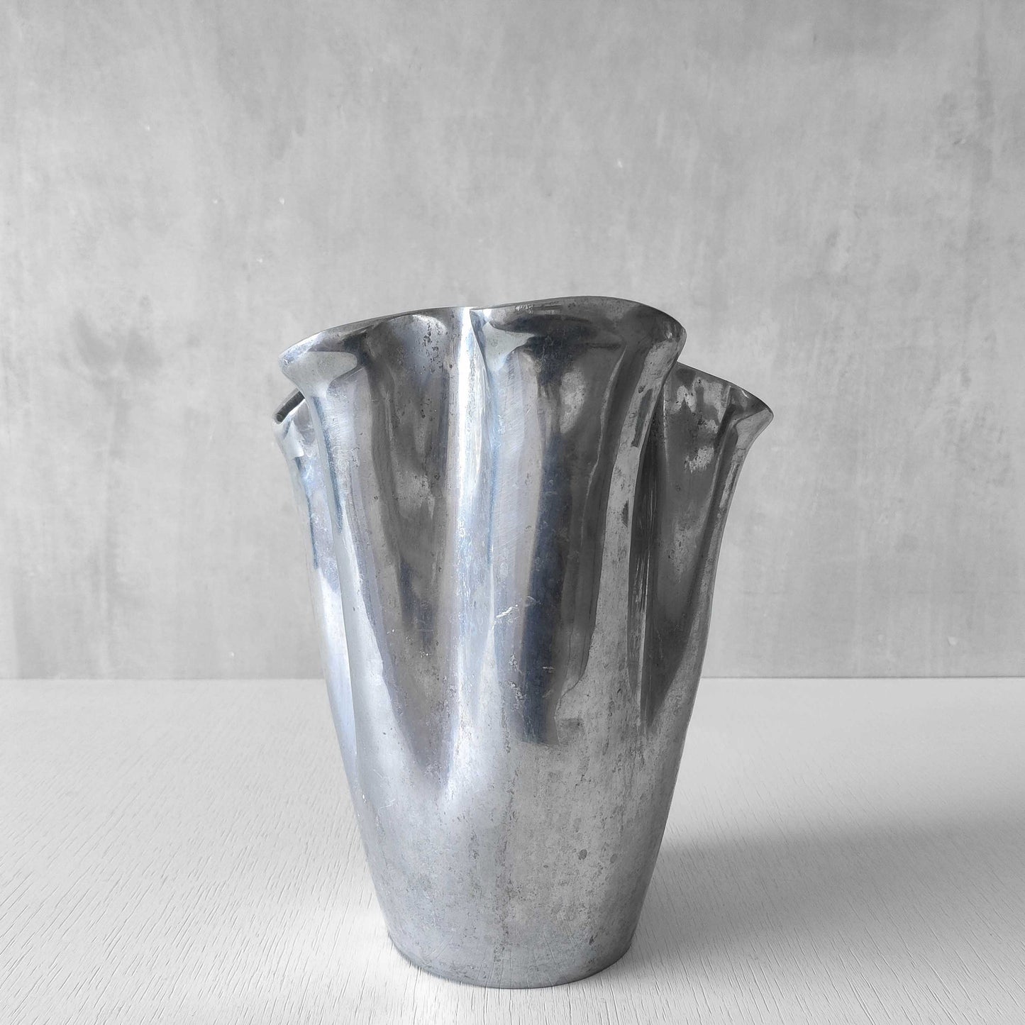 Cast aluminium vase