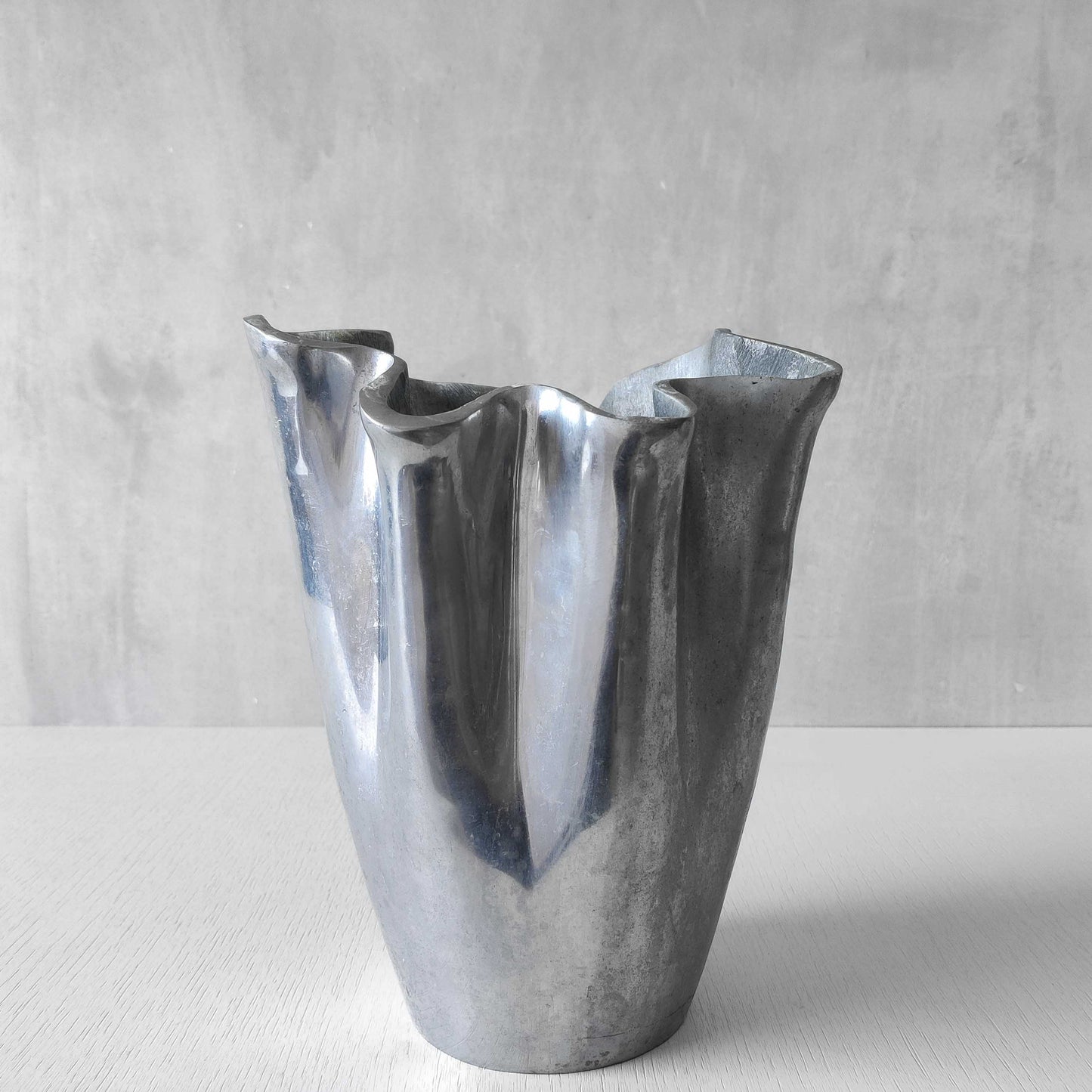 Cast aluminium vase