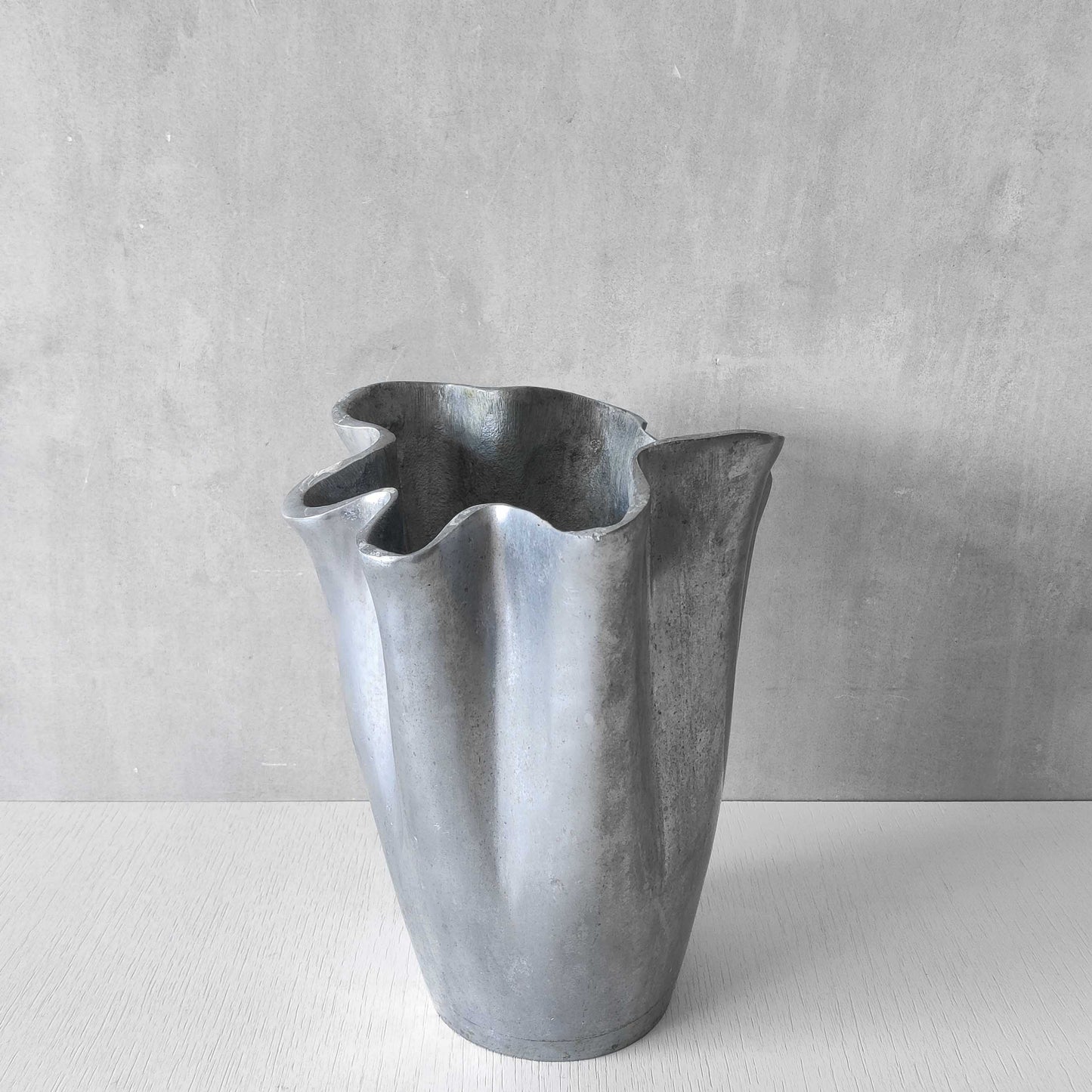 Cast aluminium vase