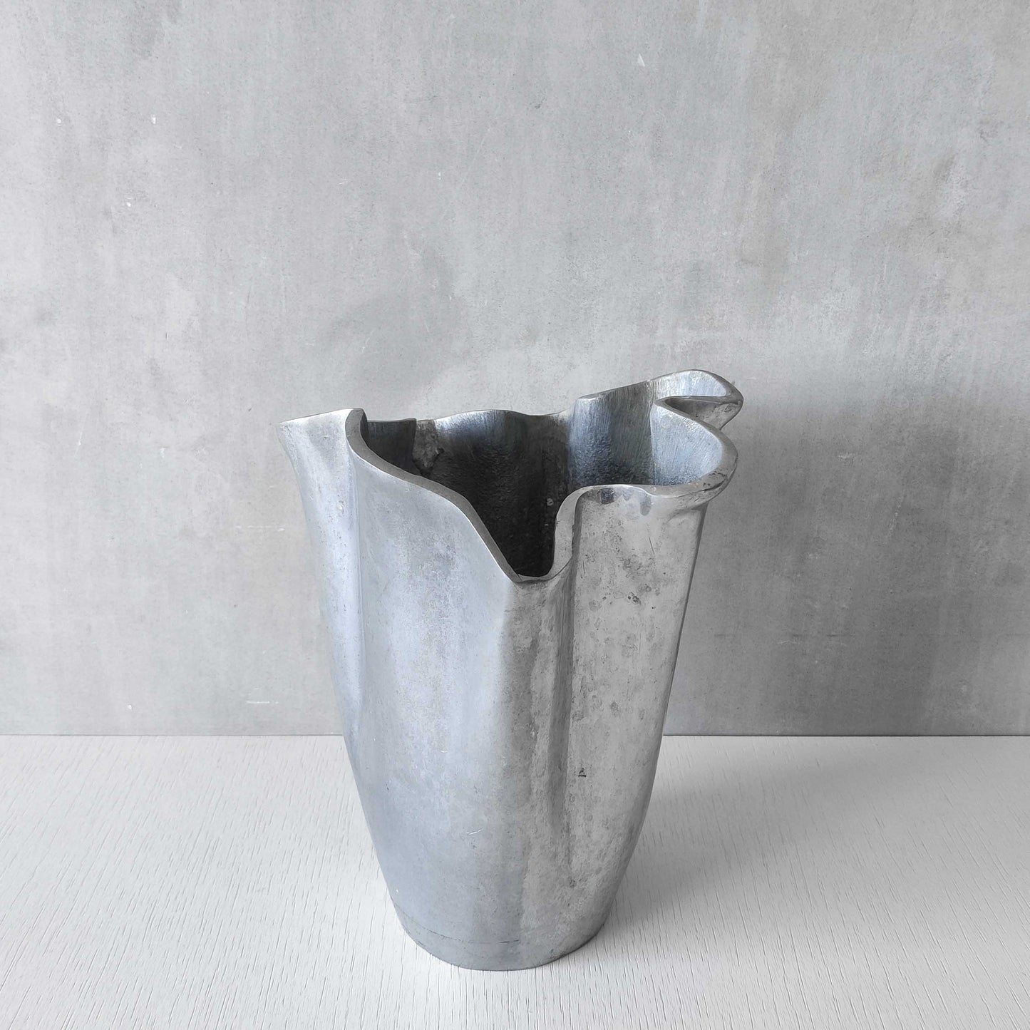 Cast aluminium vase