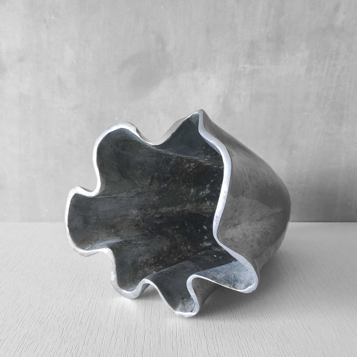 Cast aluminium vase