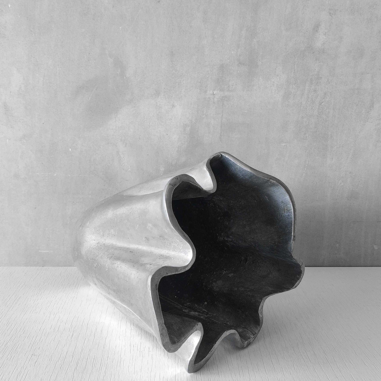Cast aluminium vase