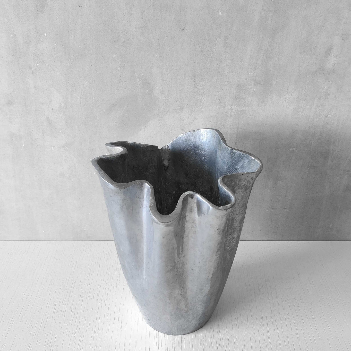 Cast aluminium vase