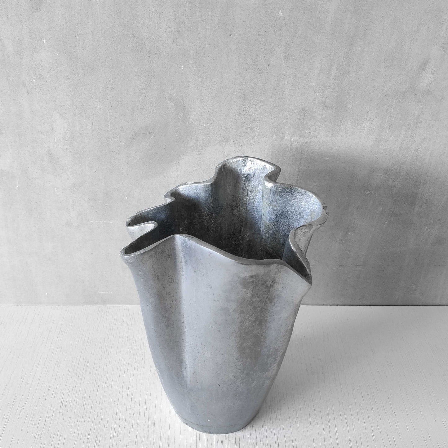 Cast aluminium vase