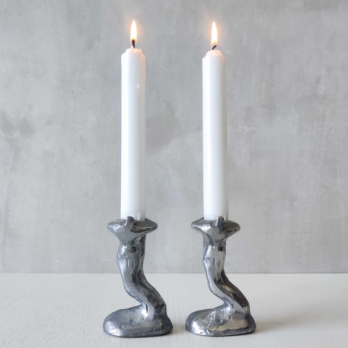 Pair of vintage 1980s ART3 David Marshall style cast aluminum brutalist candle holders