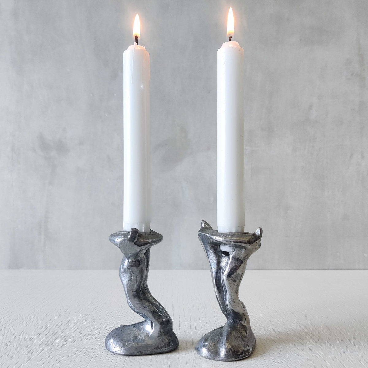 Pair of vintage 1980s ART3 David Marshall style cast aluminum brutalist candle holders