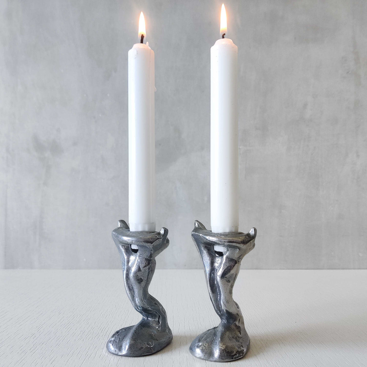 Pair of vintage 1980s ART3 David Marshall style cast aluminum brutalist candle holders