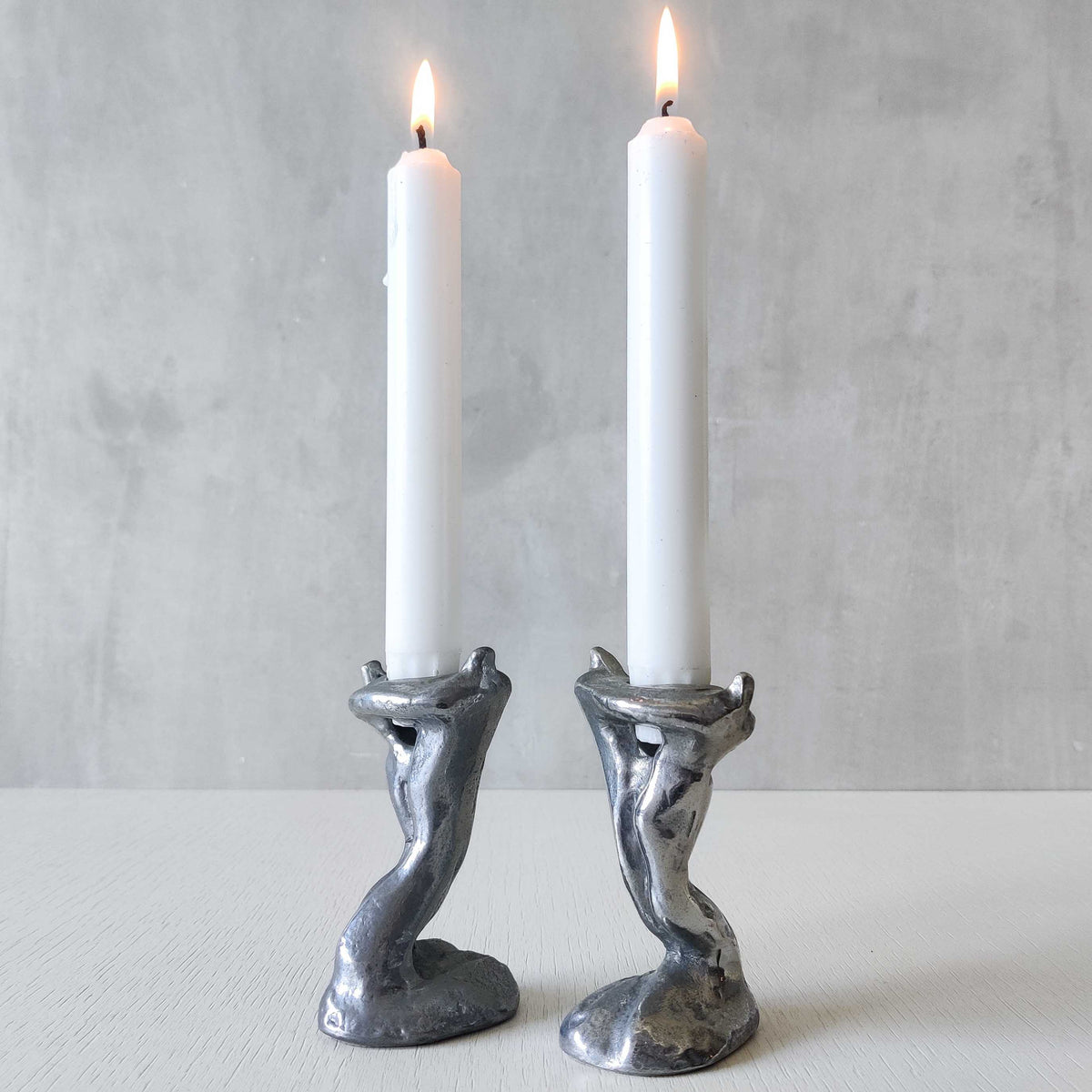 Pair of vintage 1980s ART3 David Marshall style cast aluminum brutalist candle holders