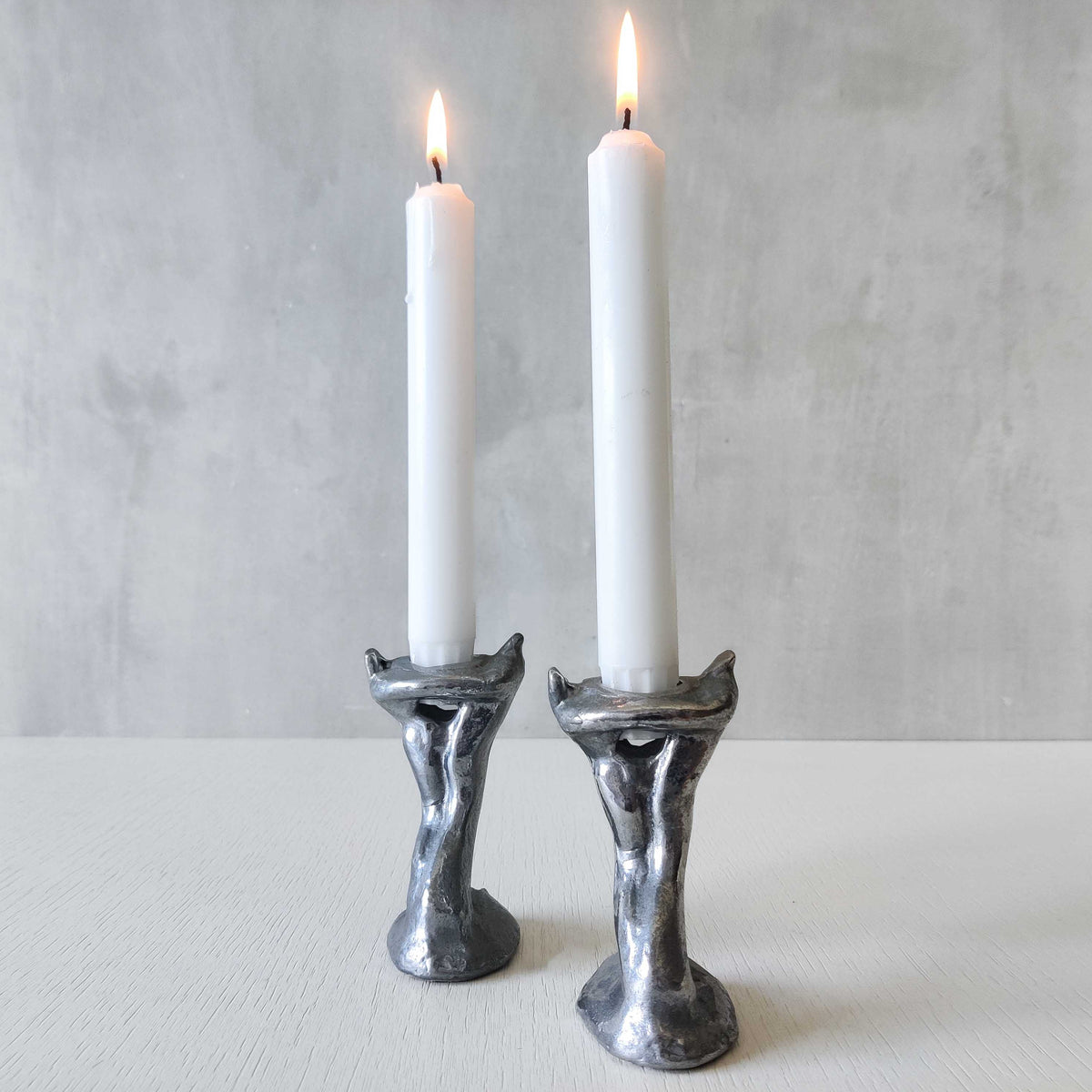 Pair of vintage 1980s ART3 David Marshall style cast aluminum brutalist candle holders