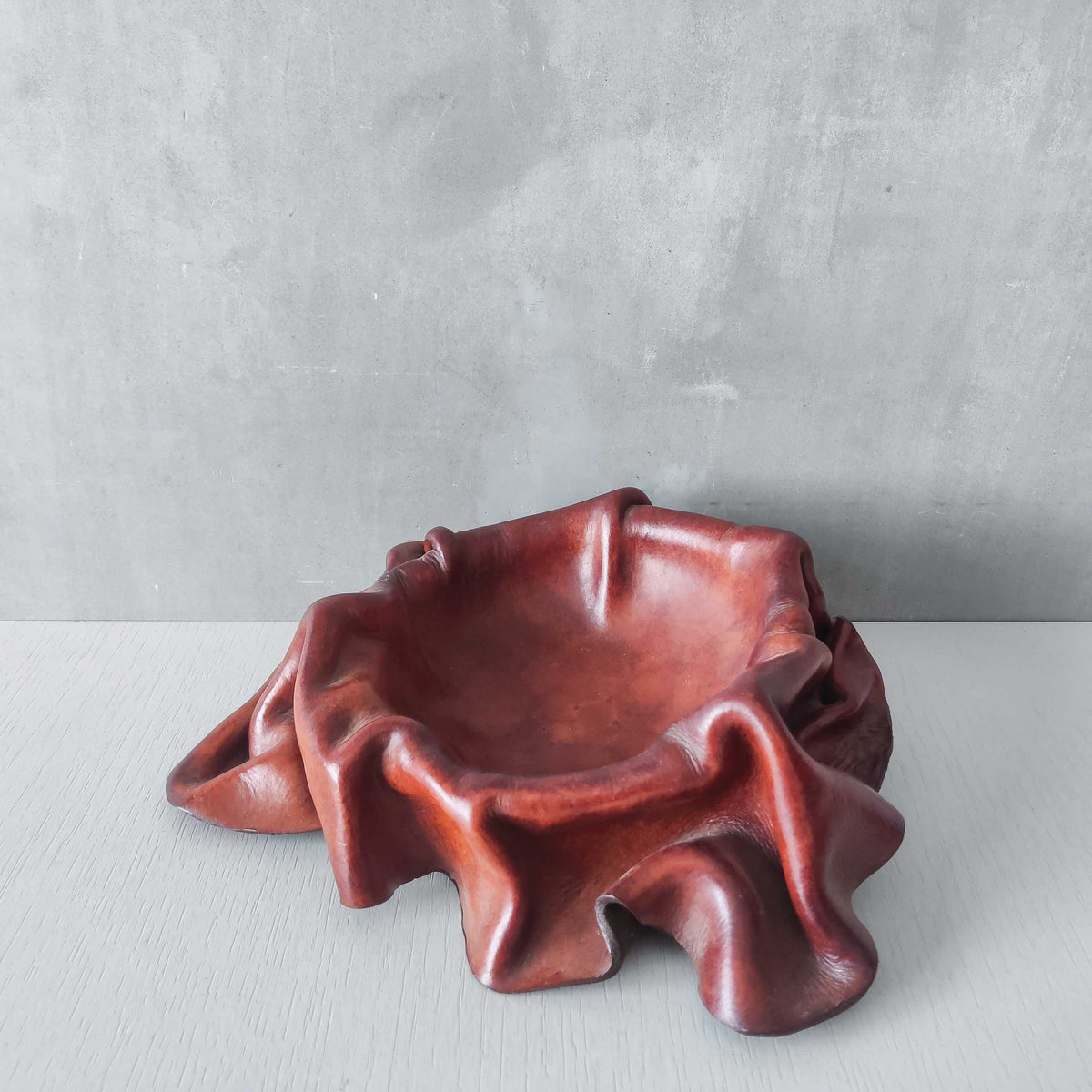 Vintage sculptural leathercraft moulded vide poche bowl