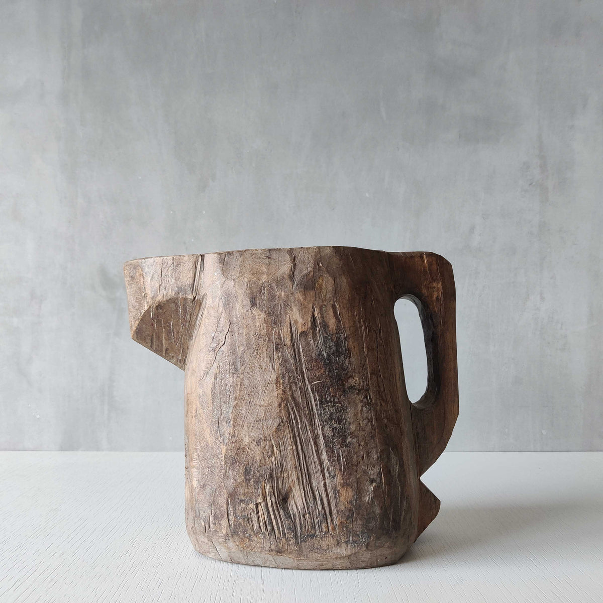 Folk art sculptural heavy hardwood chainsaw cut carved jug 1