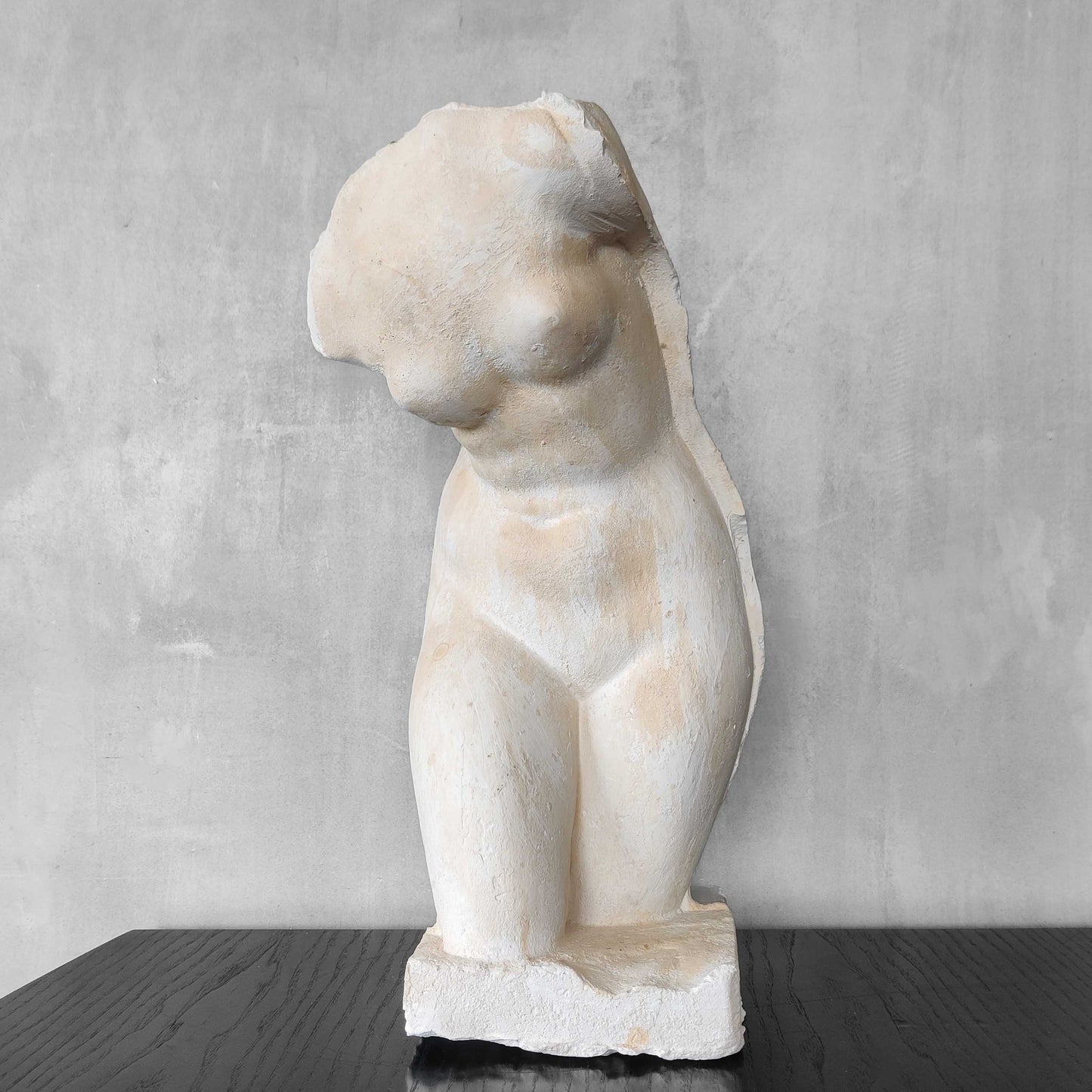 A large vintage studio plaster cast sculpture study of a female torso