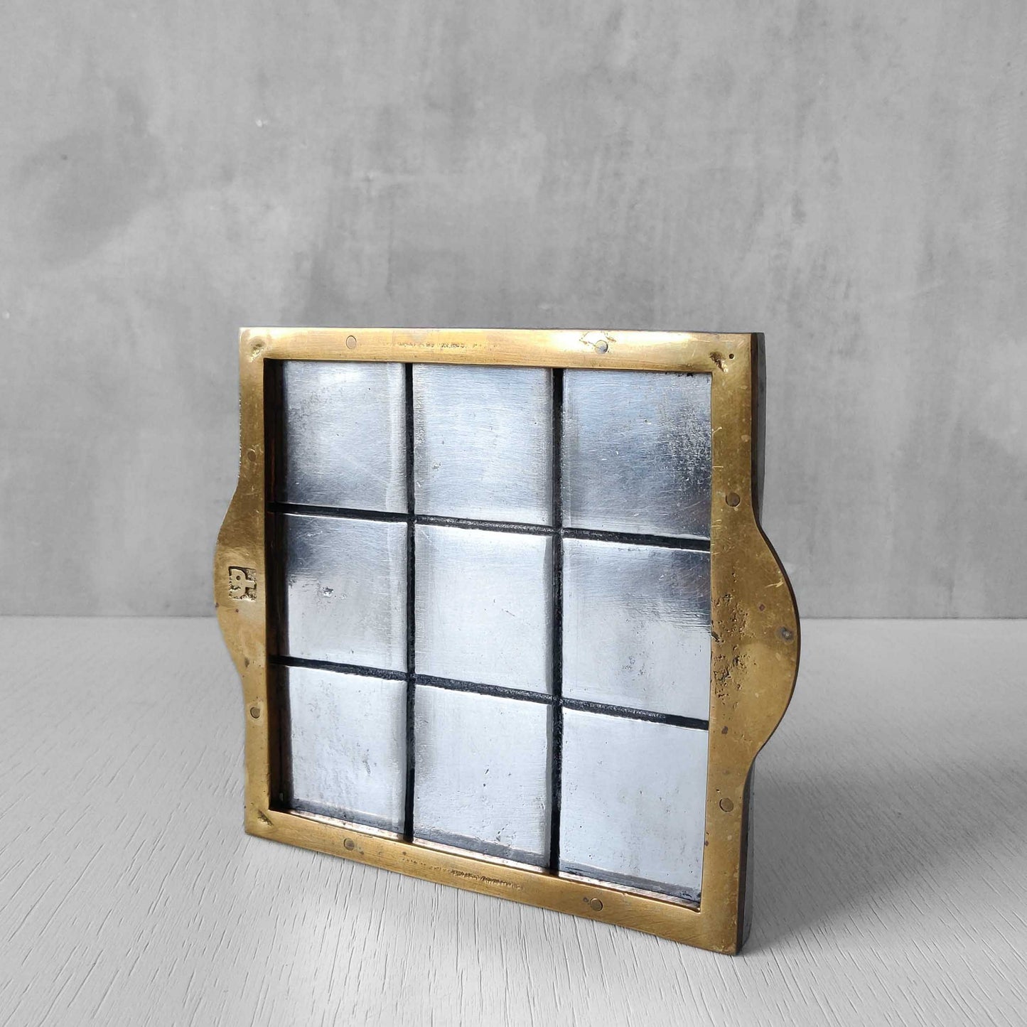 Vintage David Marshall sand cast brass and aluminium small gridded tray
