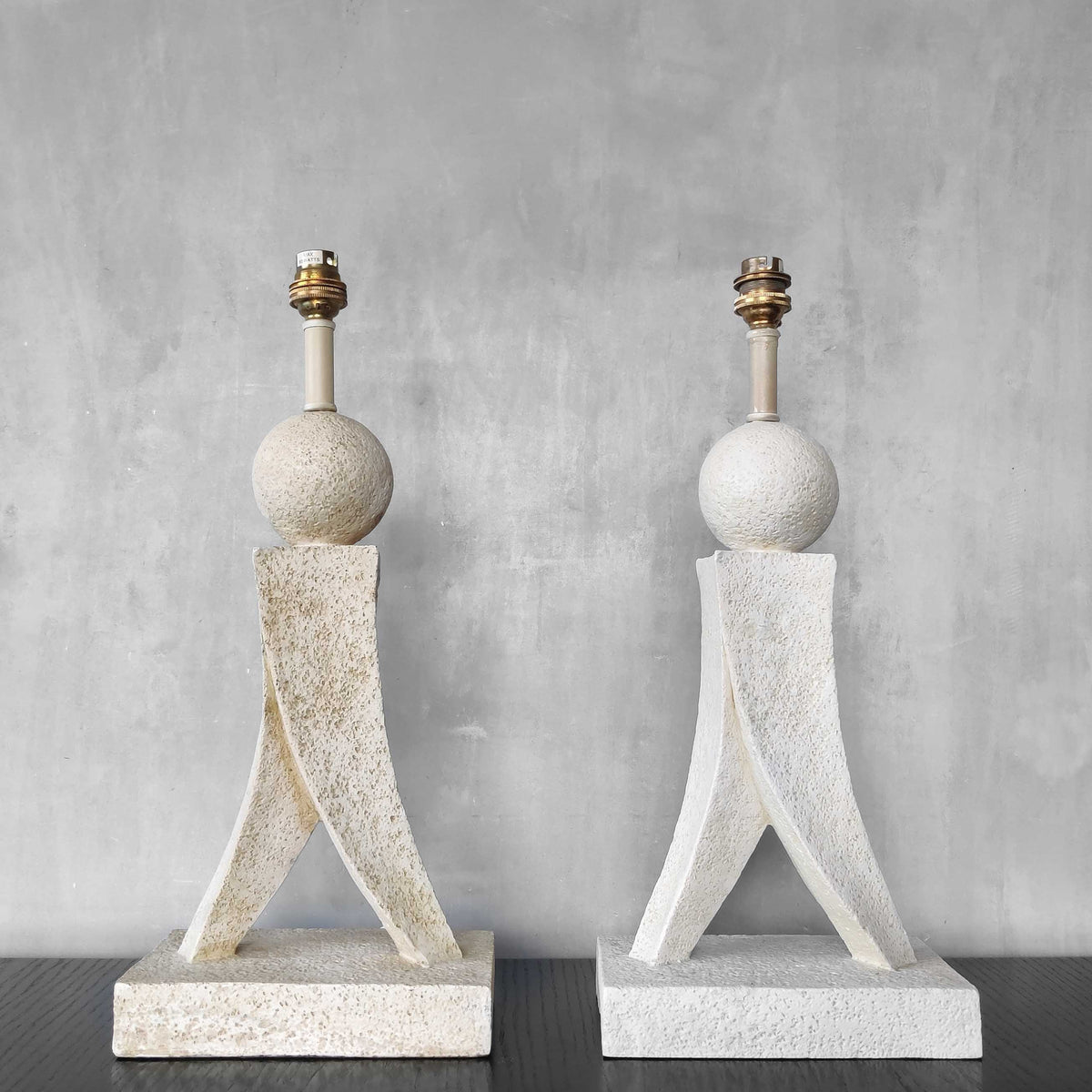 A pair of architectural sculptural postmodern table lamps