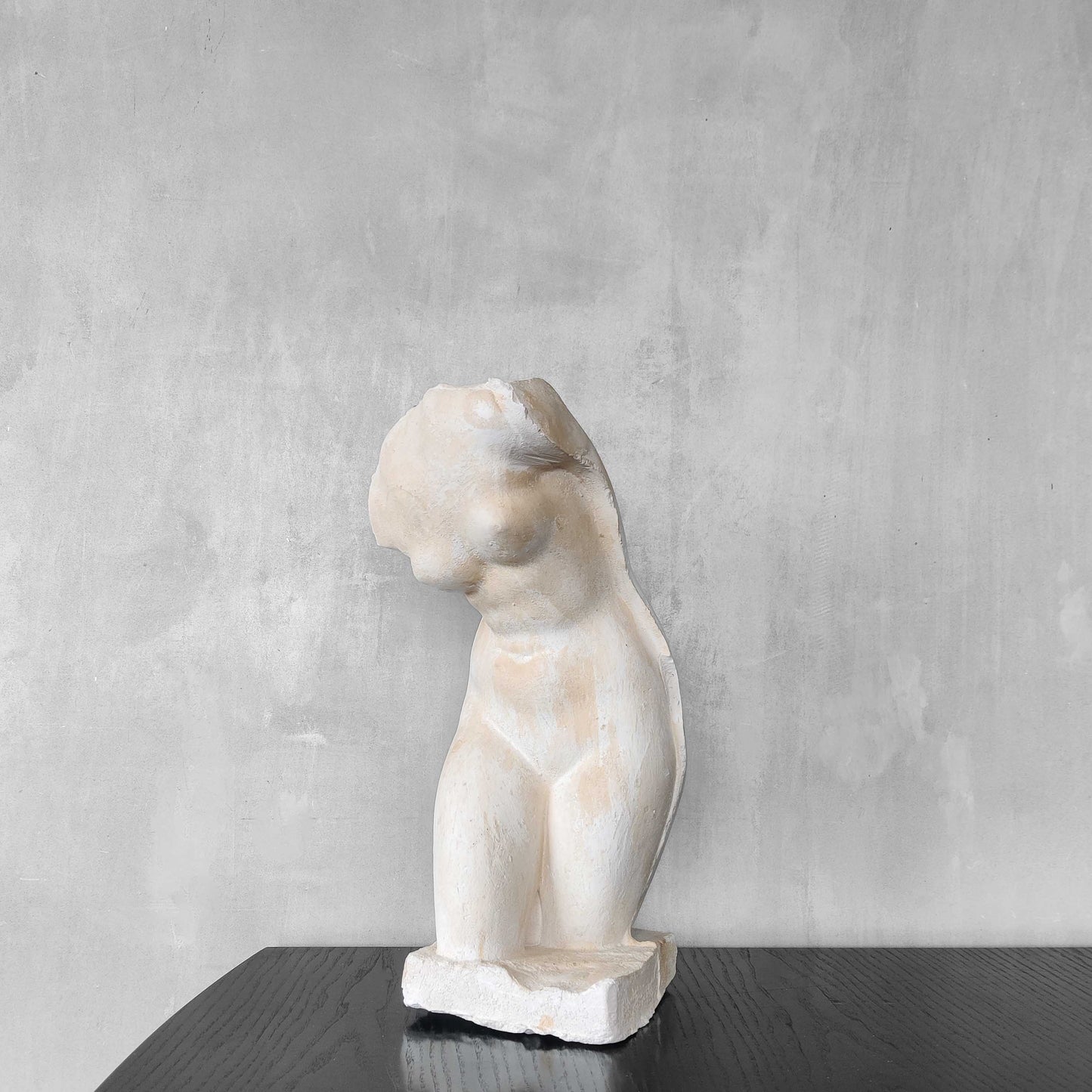 A large vintage studio plaster cast sculpture study of a female torso