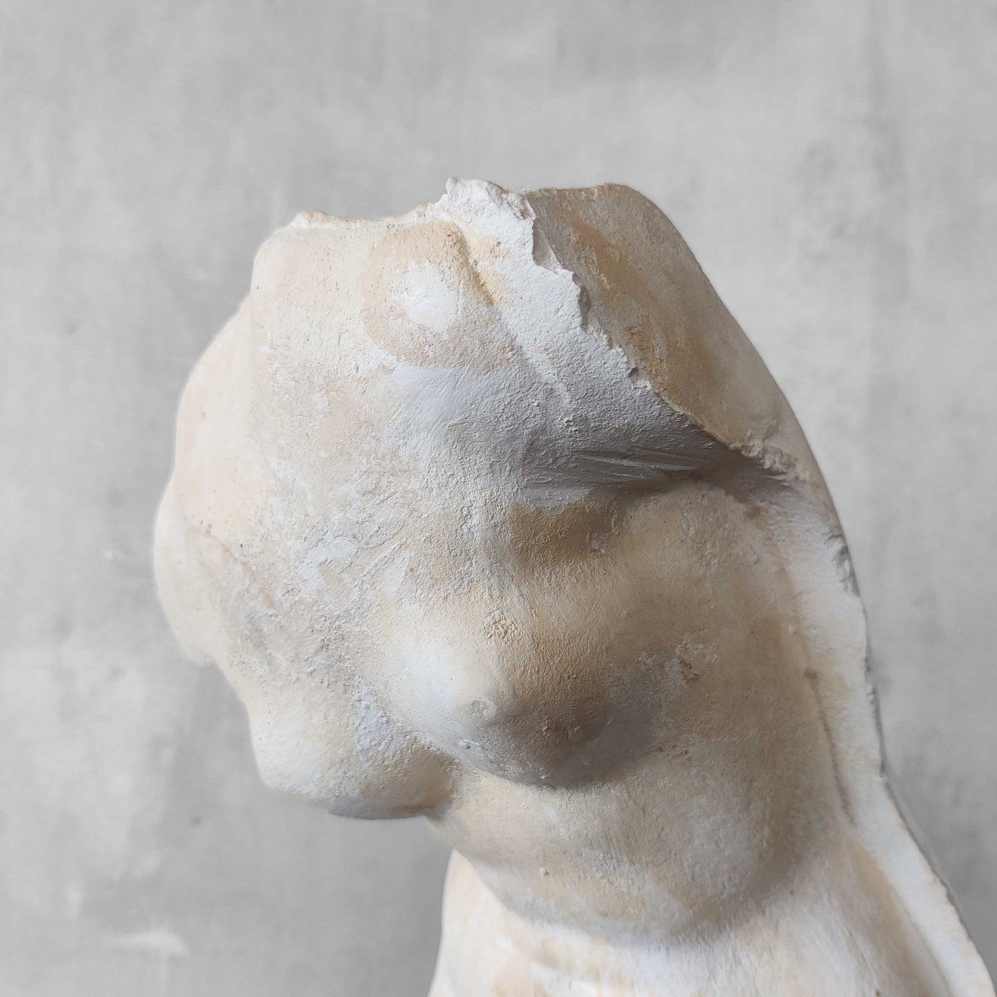 A large vintage studio plaster cast sculpture study of a female torso