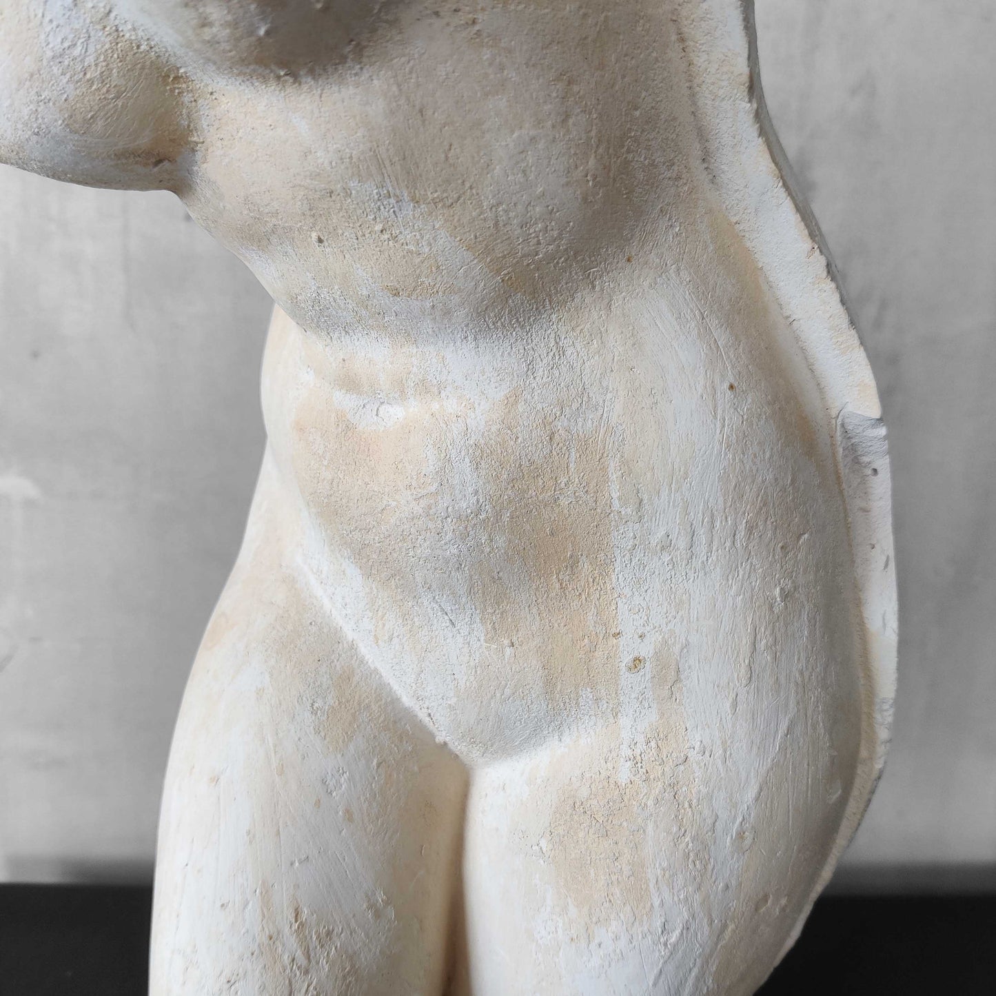 A large vintage studio plaster cast sculpture study of a female torso