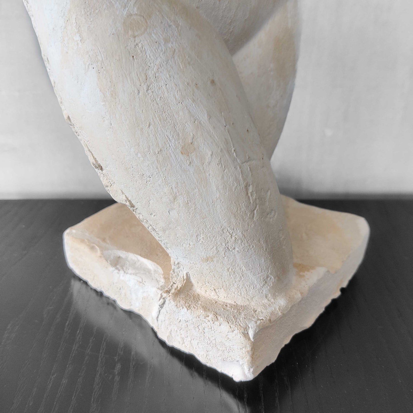 A large vintage studio plaster cast sculpture study of a female torso