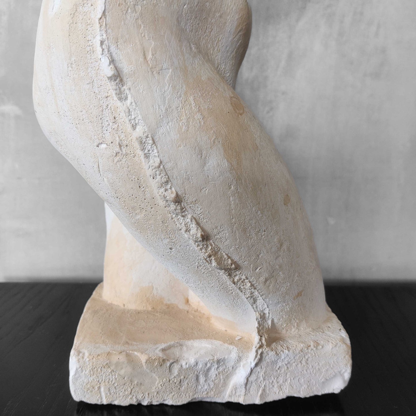 A large vintage studio plaster cast sculpture study of a female torso